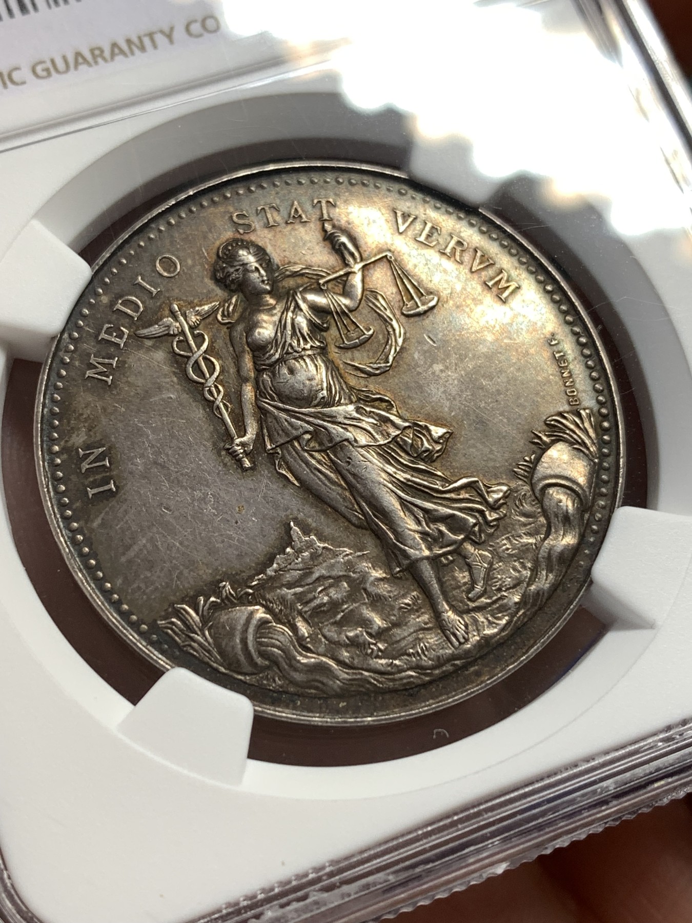 《竞宝斋》第189场-周日，周一 2场 (全场包邮) NGC-AU58 法国1882里昂丝绸女神银代币 高浮雕 丰饶角 精美五彩代币