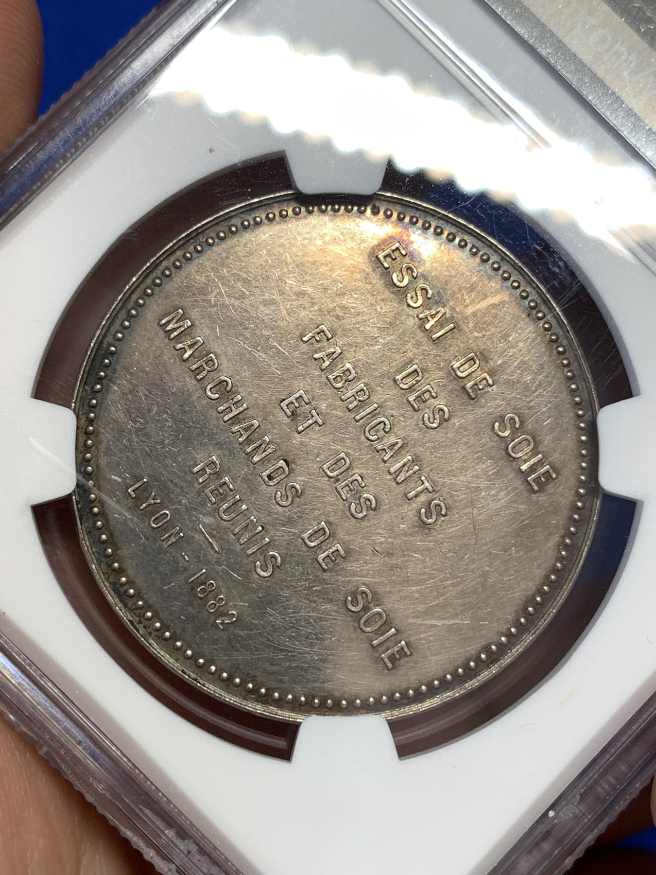 《竞宝斋》第189场-周日，周一 2场 (全场包邮) NGC-AU58 法国1882里昂丝绸女神银代币 高浮雕 丰饶角 精美五彩代币