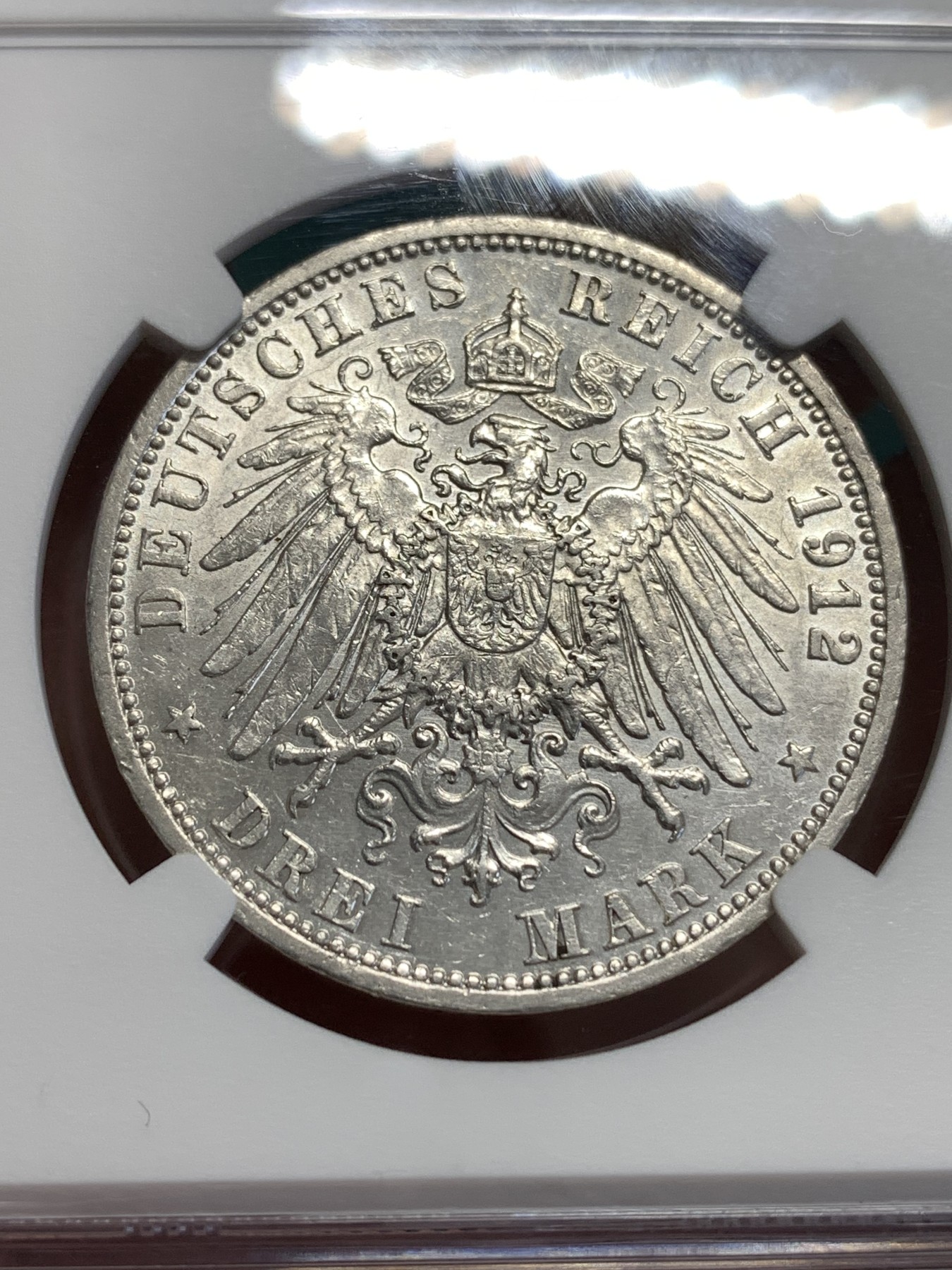 《竞宝斋》第189场-周日，周一 2场 (全场包邮) NGC MS62 德国1912吕贝克自由市双头鹰3马克银币