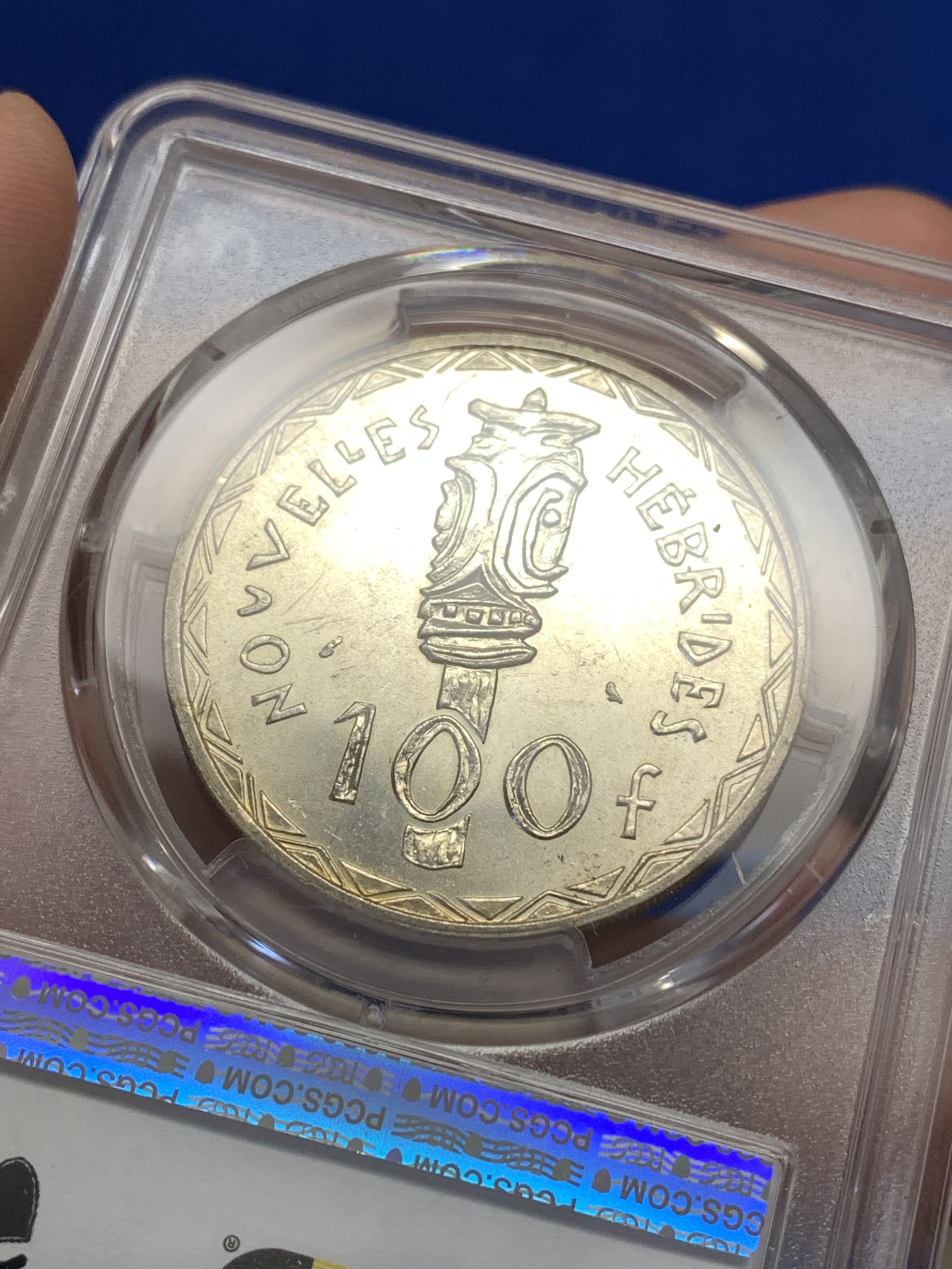 《竞宝斋》第189场-周日，周一 2场 (全场包邮) PCGS金盾 MS62 新赫布里底1966年100法郎银币