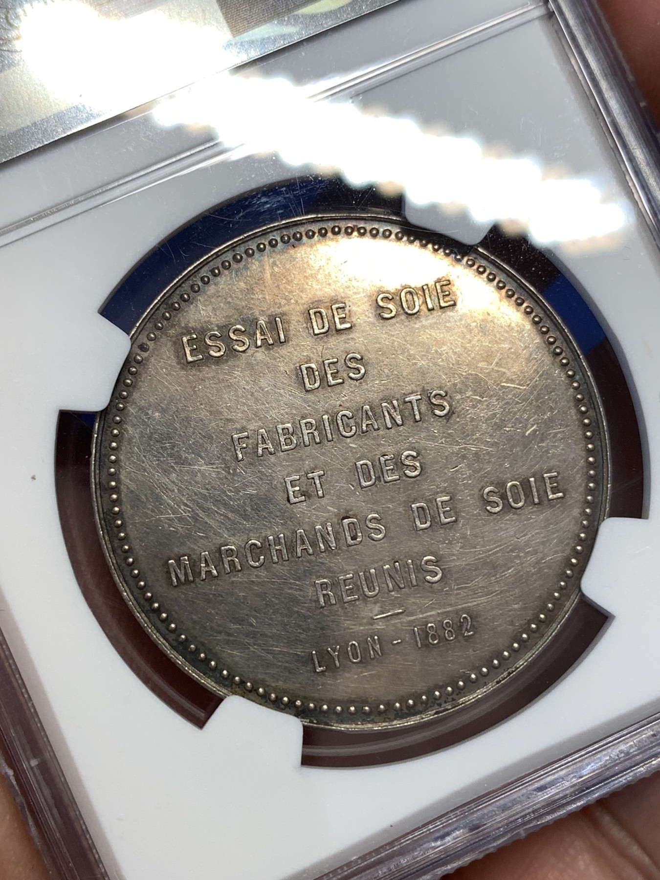 《竞宝斋》第189场-周日，周一 2场 (全场包邮) NGC-AU58 法国1882里昂丝绸女神银代币 高浮雕 丰饶角 精美五彩代币