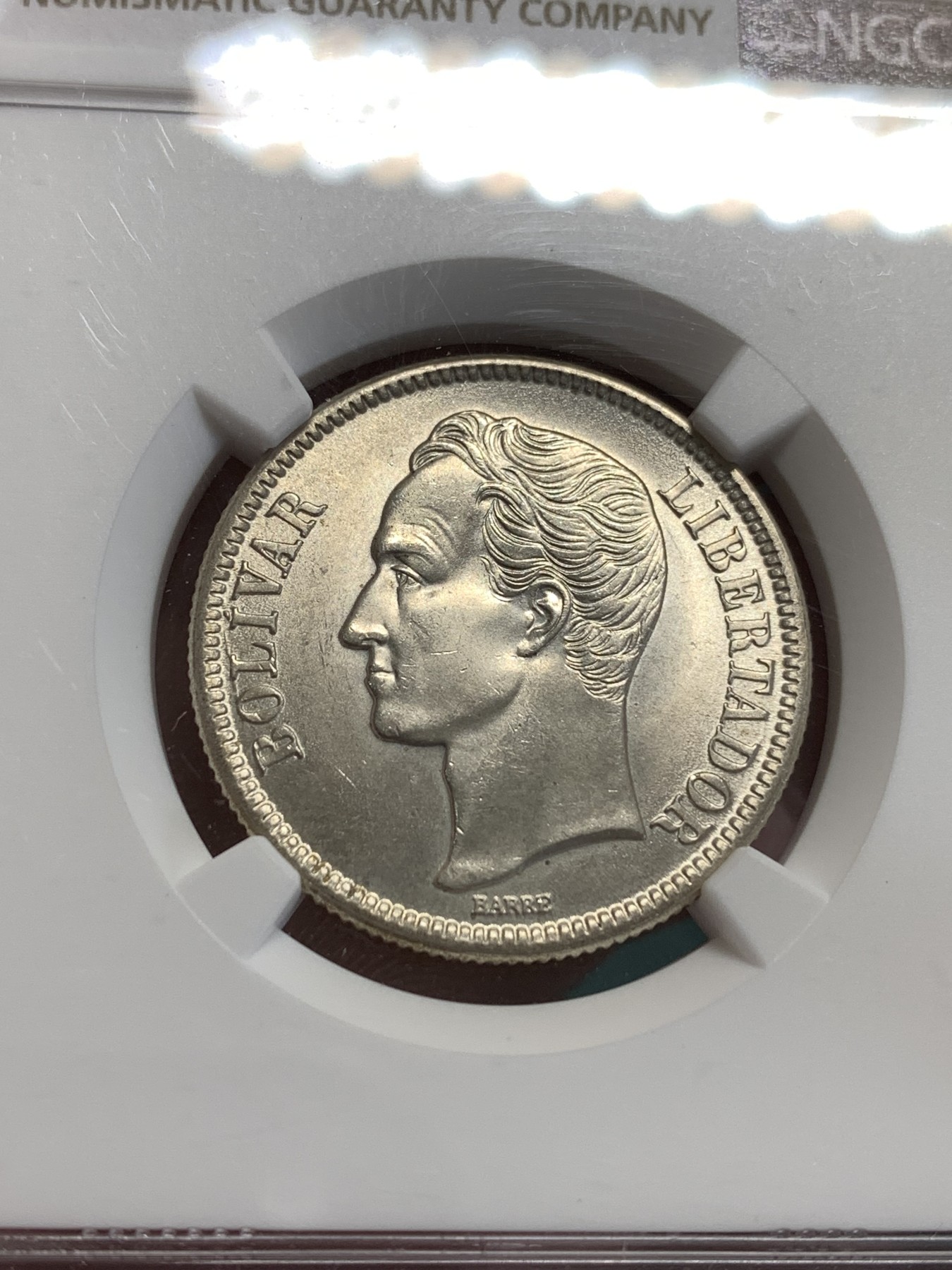 《竞宝斋》第189场-周日，周一 2场 (全场包邮) NGC-MS63 委内瑞拉1945 2玻利瓦尔银币 状态好几了