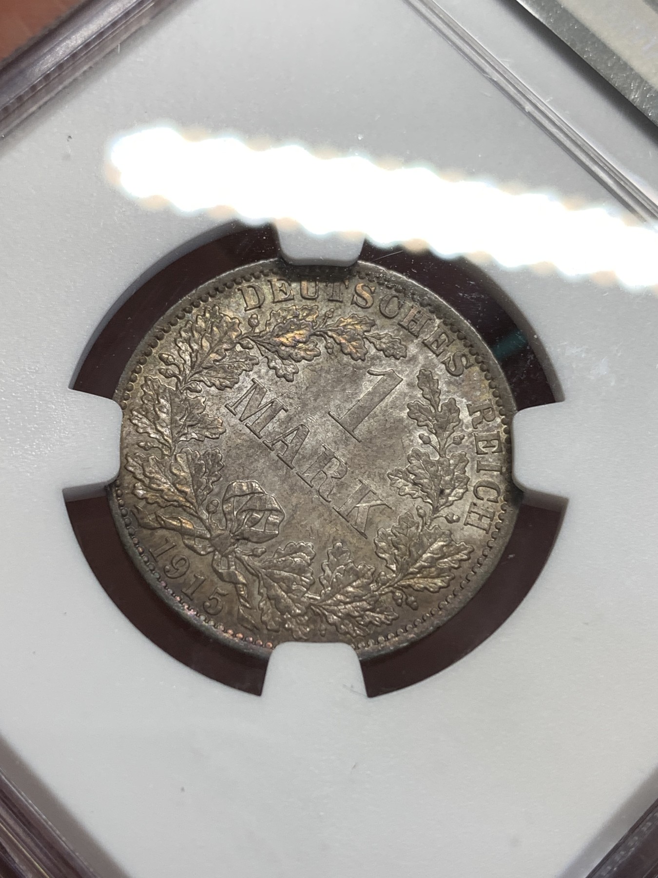 《竞宝斋》第189场-周日，周一 2场 (全场包邮) NGC-MS62 德国1915年A版1马克银币 整体五彩包浆 炫彩夺目