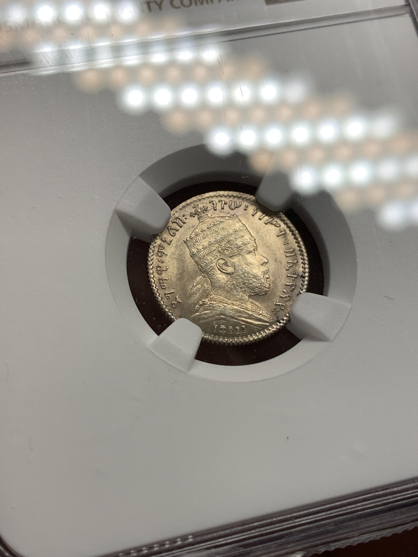 《竞宝斋》第189场-周日，周一 2场 (全场包邮) NGC-MS63 埃塞俄比亚 1895年 狮子左扛旗1G小银币