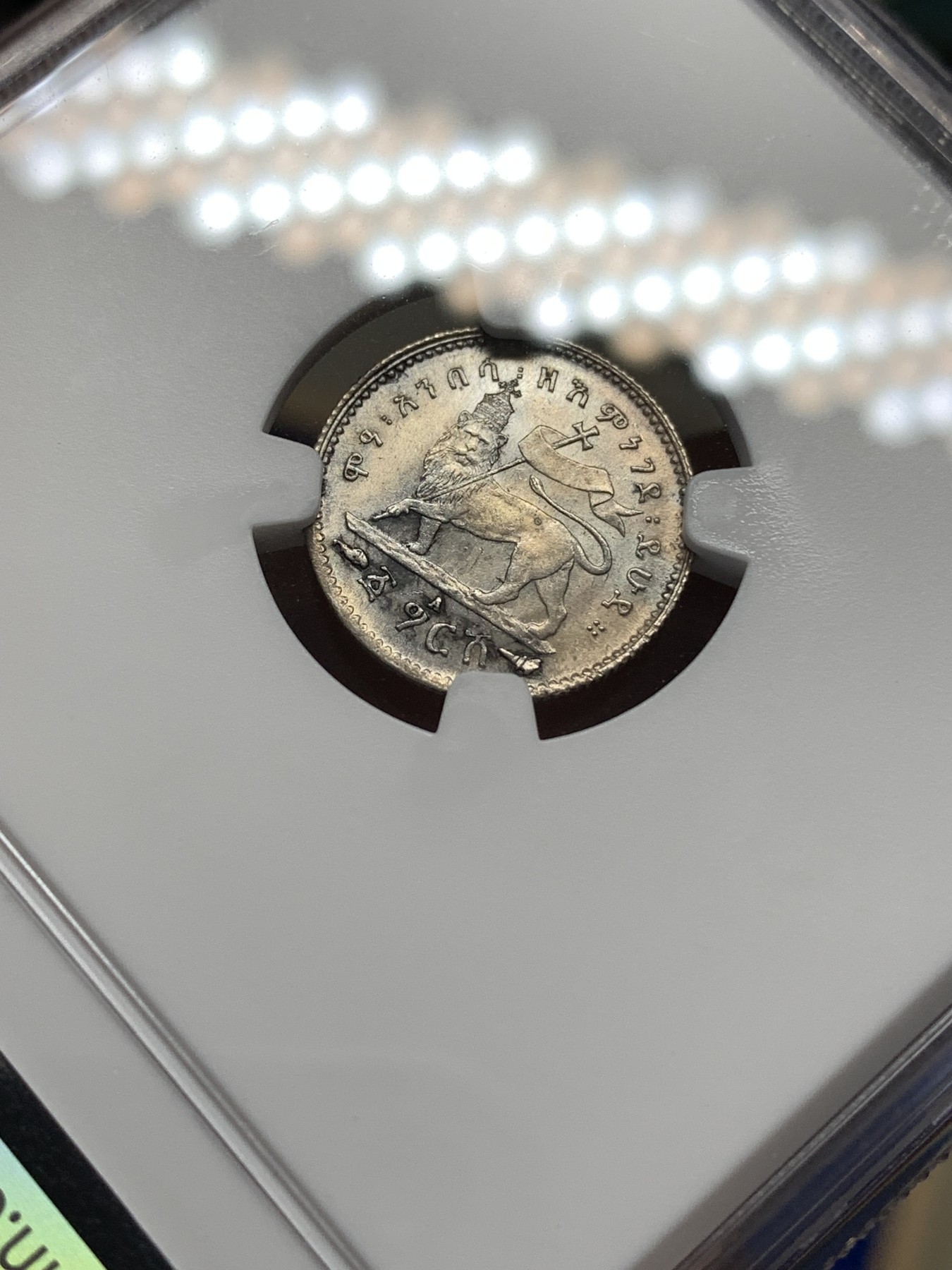 《竞宝斋》第189场-周日，周一 2场 (全场包邮) NGC-MS63 埃塞俄比亚 1895年 狮子左扛旗1G小银币