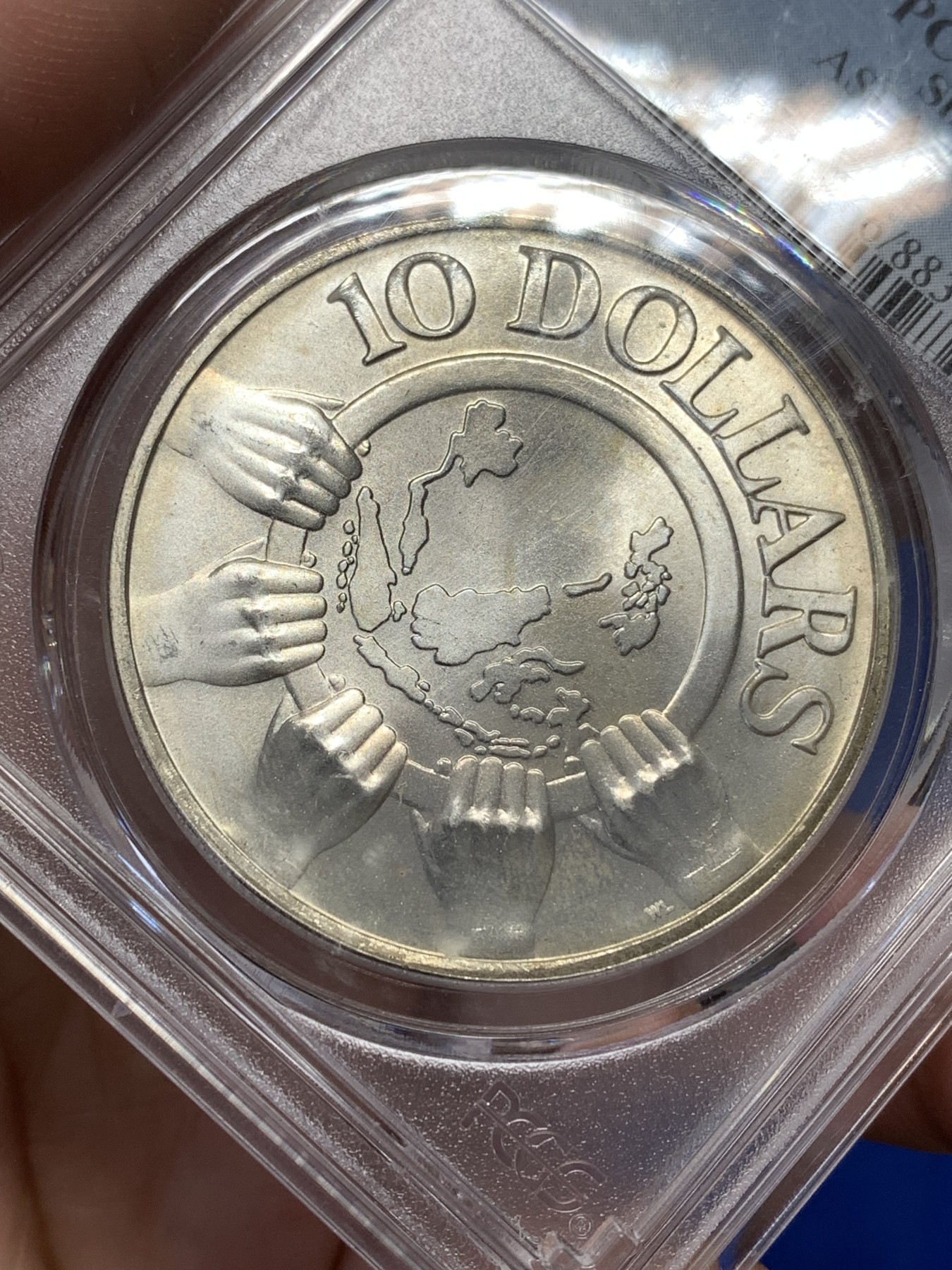 《竞宝斋》第189场-周日，周一 2场 (全场包邮) PCGS MS66 新加坡1977年东盟10周年10元大银币 旋转光