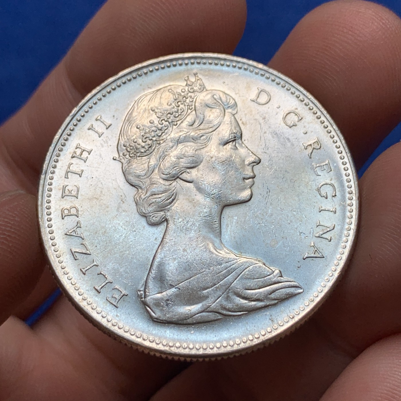 《竞宝斋》第189场-周日，周一 2场 (全场包邮) 加拿大 1966年1元划船银币 23.5克 0.8银 UNC