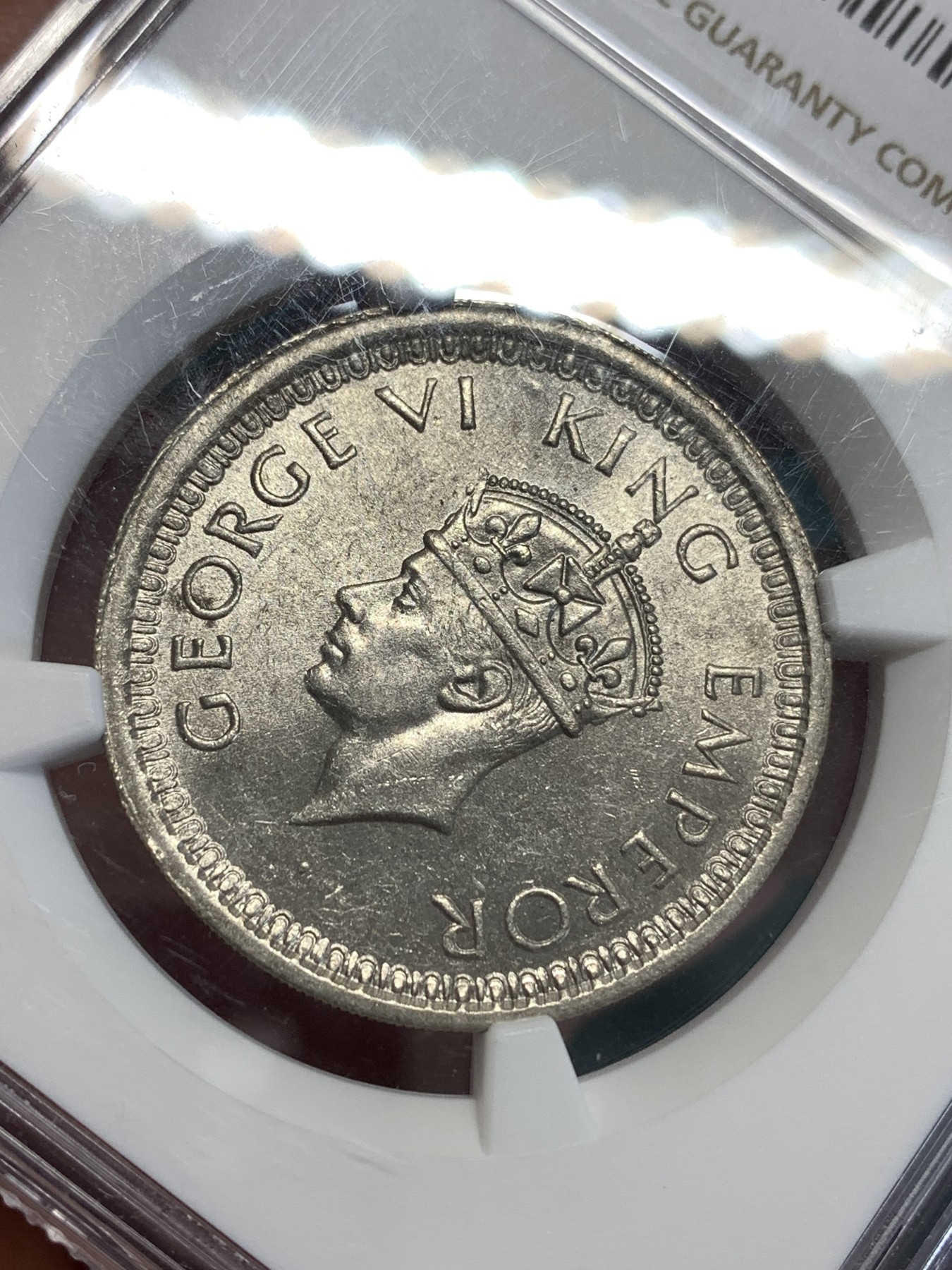 《竞宝斋》第189场-周日，周一 2场 (全场包邮) NGC MS62 乔治六世印度1卢比 1945年L版