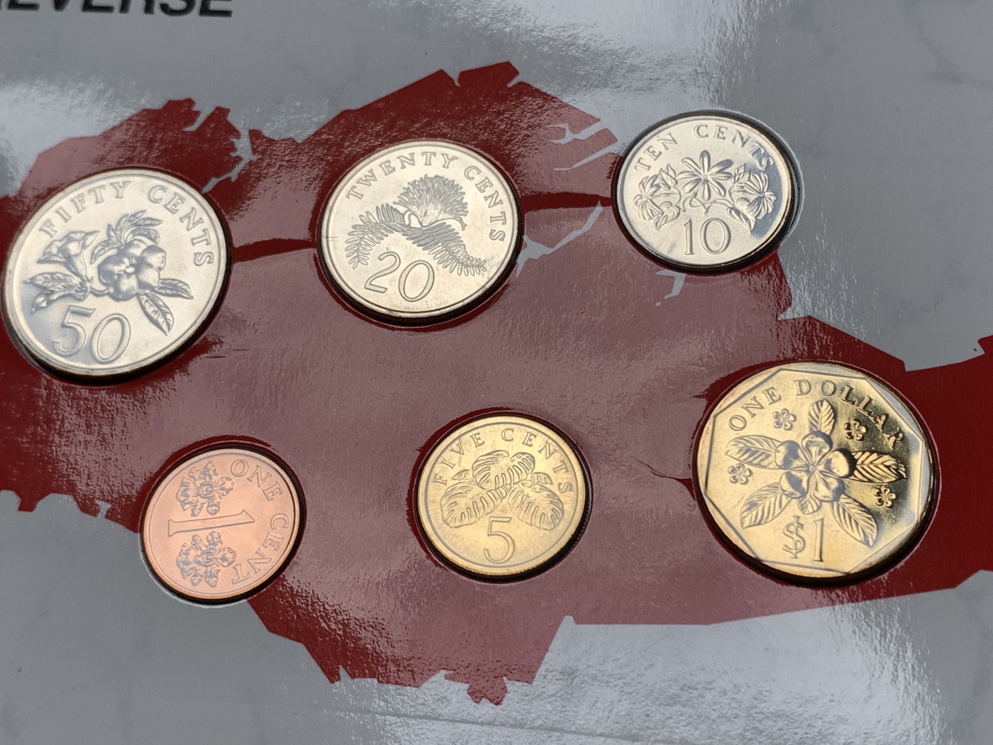 《竞宝斋》第190场-周日，周一 2场 (全场包邮) 新加坡1989年流通硬币6枚套蛇年生肖纪念卡册、新加坡马来西亚邮币册、马来亚和英属婆罗洲UNC品硬币4枚