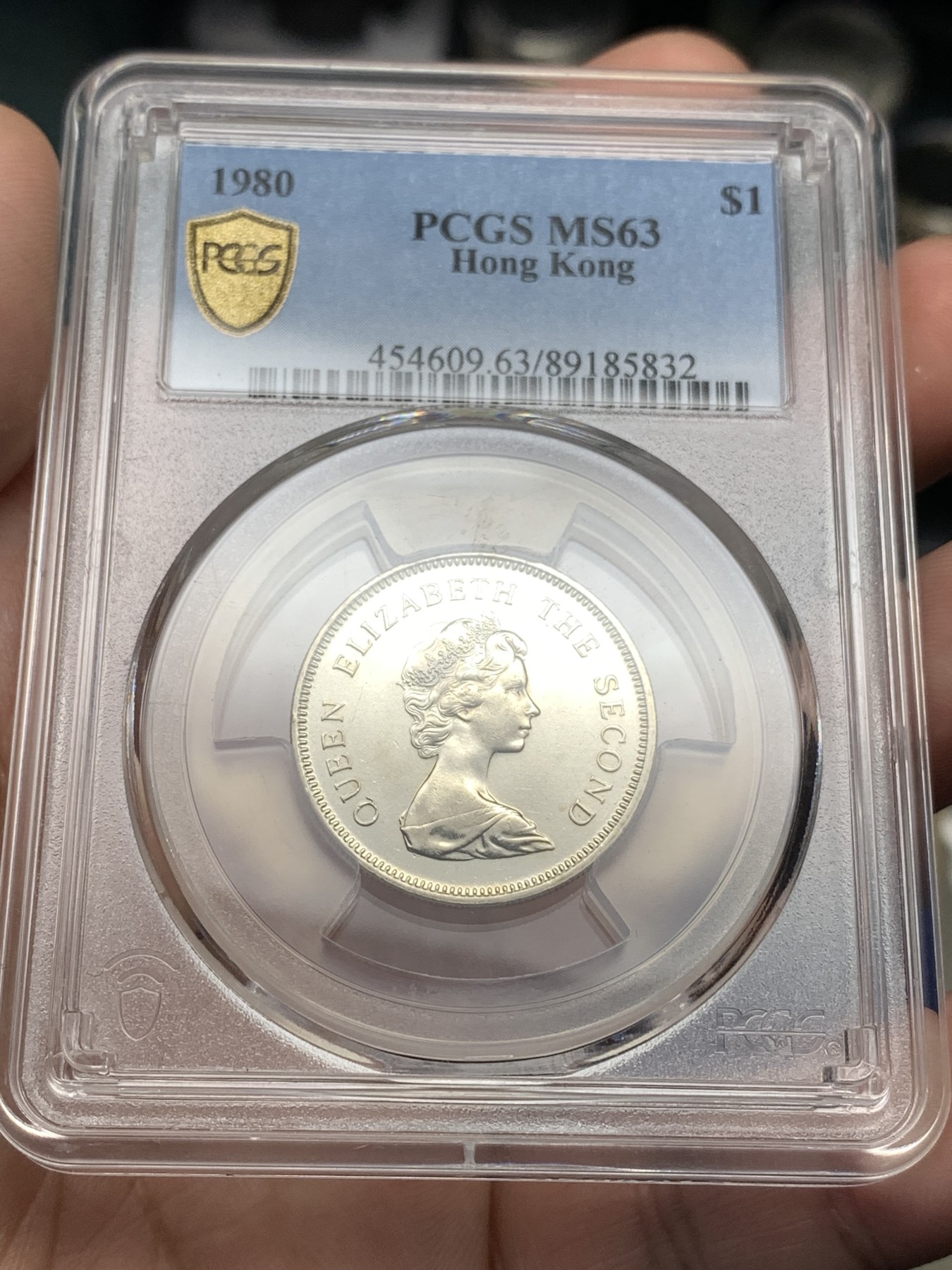 《竞宝斋》第190场-周日，周一 2场 (全场包邮) PCGS金盾 MS63 香港1980年1元镍币