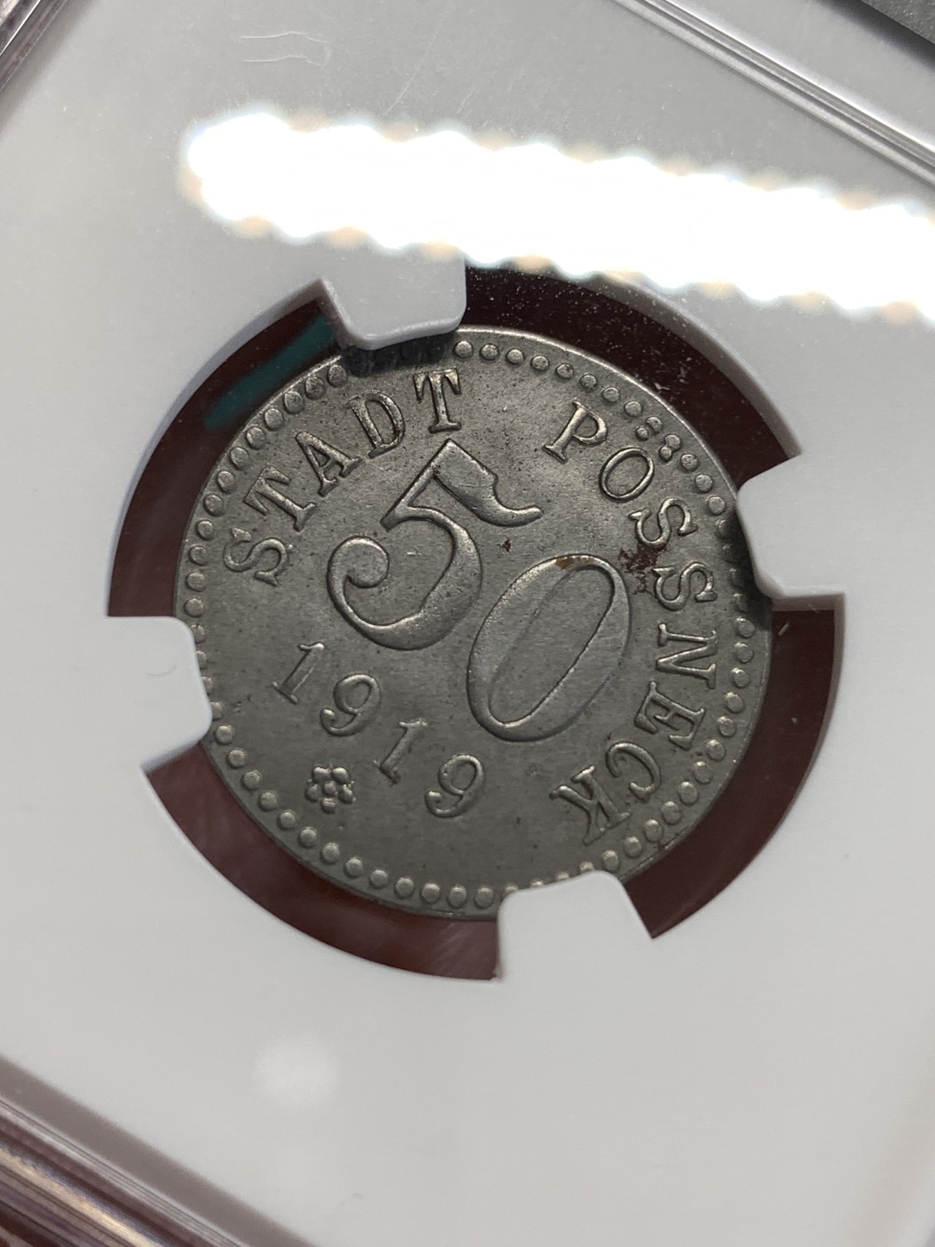 《竞宝斋》第190场-周日，周一 2场 (全场包邮) NGC-UNC 德国1919年德紧塔勒-哈兹50芬尼铁币 两面深打原始包浆 这个应该有分的太严了 仅见入盒