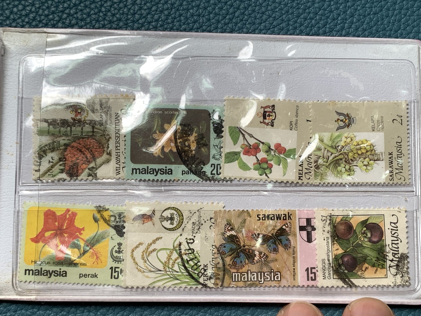 《竞宝斋》第190场-周日，周一 2场 (全场包邮) 新加坡1989年流通硬币6枚套蛇年生肖纪念卡册、新加坡马来西亚邮币册、马来亚和英属婆罗洲UNC品硬币4枚