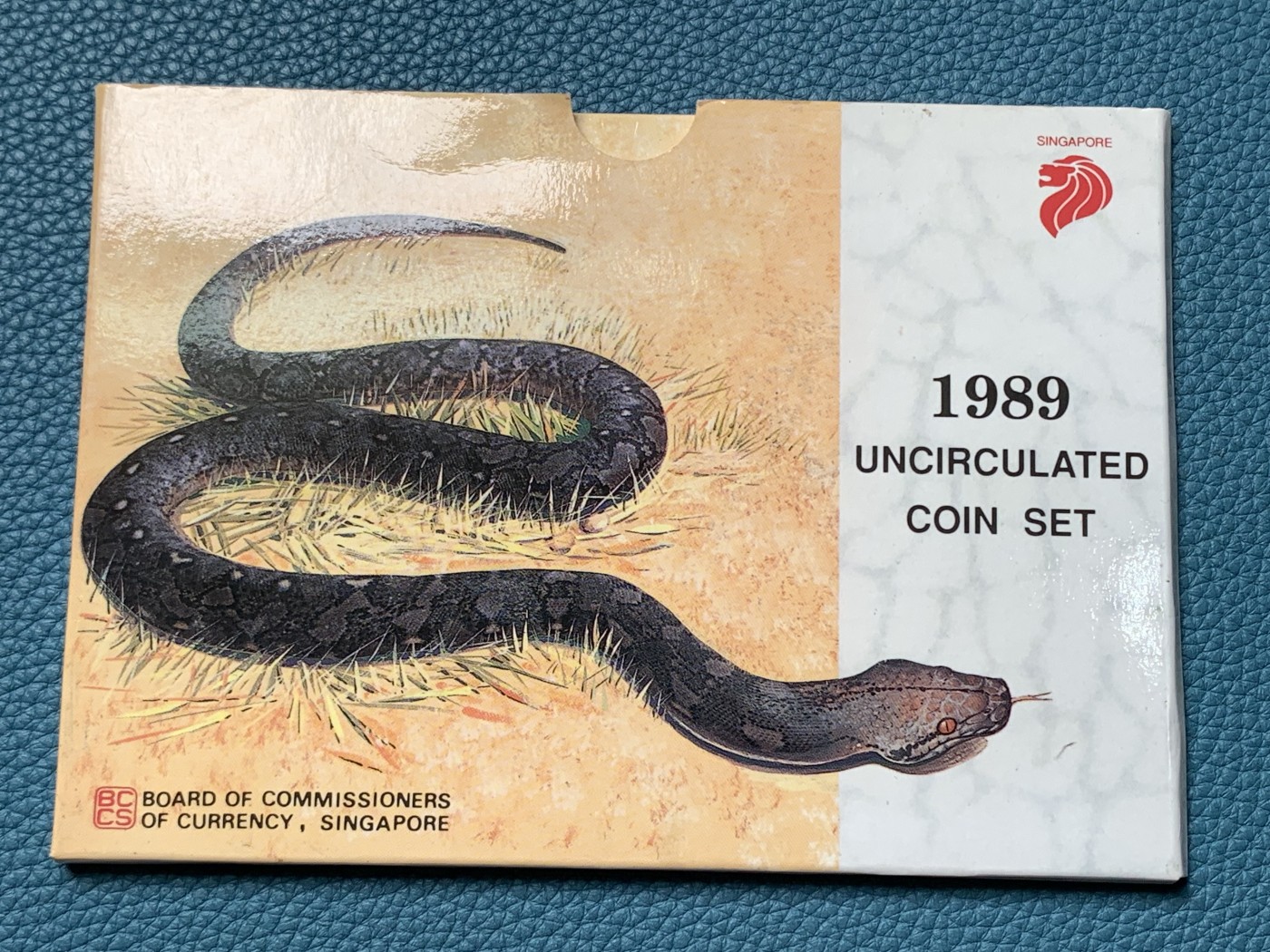 《竞宝斋》第190场-周日，周一 2场 (全场包邮) 新加坡1989年流通硬币6枚套蛇年生肖纪念卡册、新加坡马来西亚邮币册、马来亚和英属婆罗洲UNC品硬币4枚