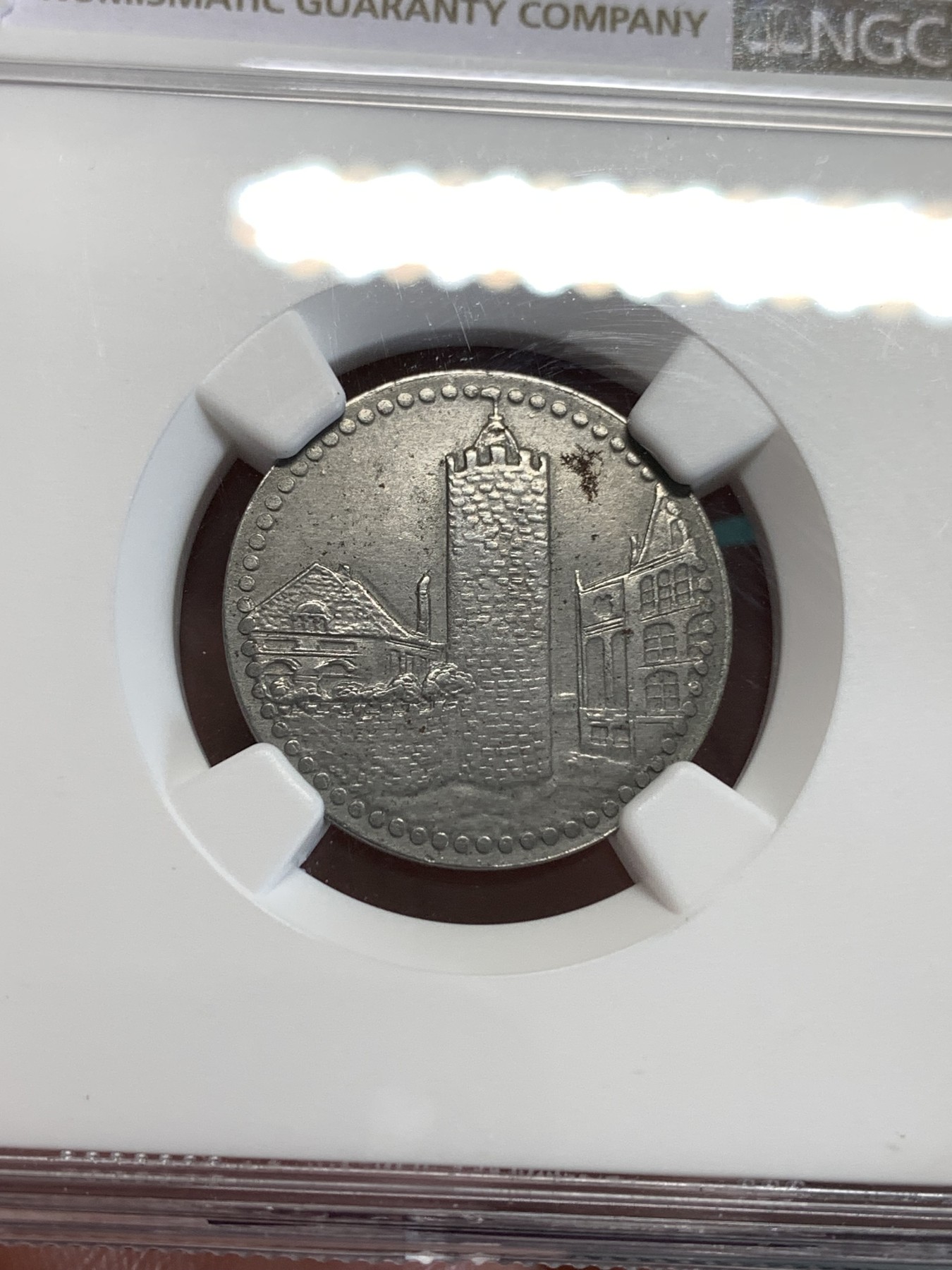 《竞宝斋》第190场-周日，周一 2场 (全场包邮) NGC-UNC 德国1919年德紧塔勒-哈兹50芬尼铁币 两面深打原始包浆 这个应该有分的太严了 仅见入盒