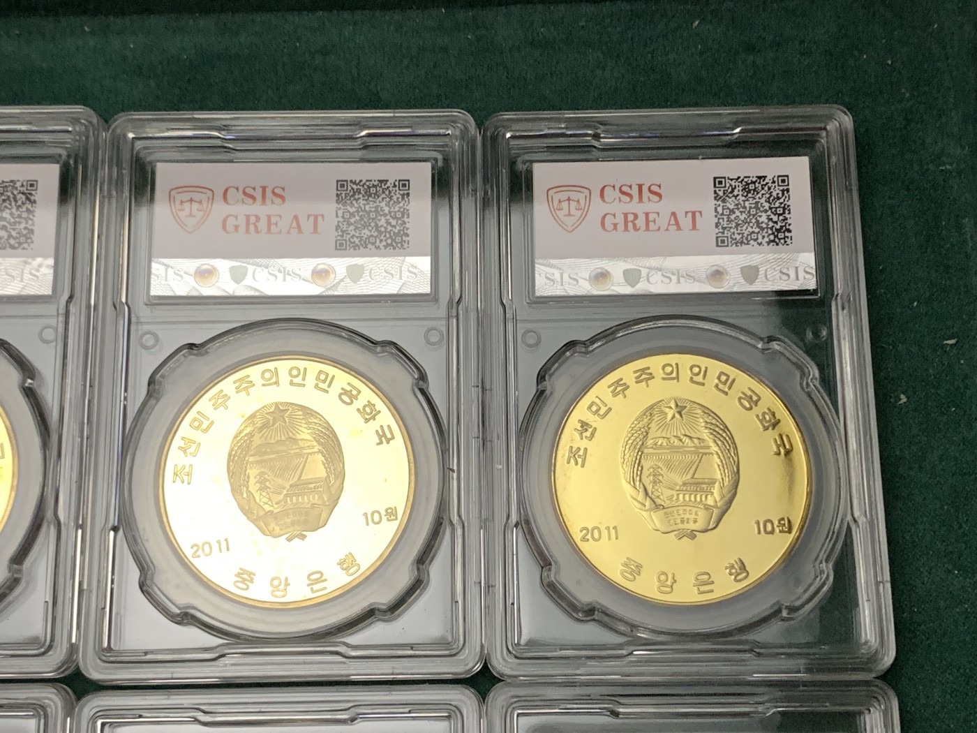 《竞宝斋》第190场-周日，周一 2场 (全场包邮) 朝鲜2011年金刚上名胜古迹精致纪念铜币10枚，图案设计精美，背面为朝鲜国徽，收藏之佳品，难得