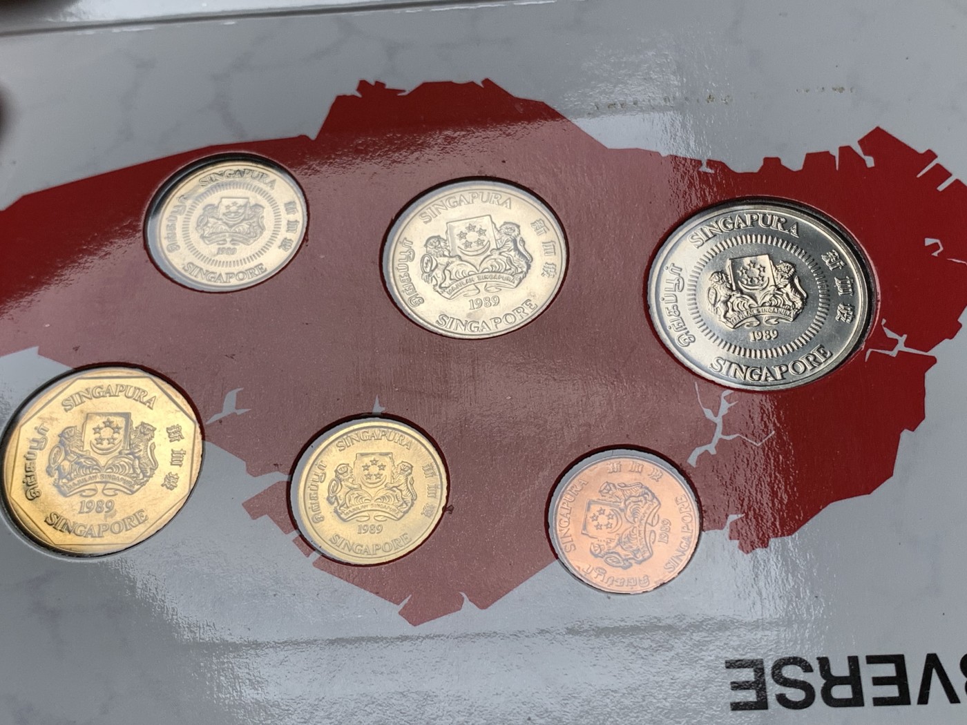 《竞宝斋》第190场-周日，周一 2场 (全场包邮) 新加坡1989年流通硬币6枚套蛇年生肖纪念卡册、新加坡马来西亚邮币册、马来亚和英属婆罗洲UNC品硬币4枚