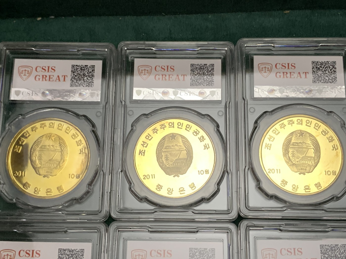 《竞宝斋》第190场-周日，周一 2场 (全场包邮) 朝鲜2011年金刚上名胜古迹精致纪念铜币10枚，图案设计精美，背面为朝鲜国徽，收藏之佳品，难得