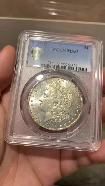 《竞宝斋》第190场-周日，周一 2场 (全场包邮) PCGS-MS63 1884-o 美国 摩根壹圆银币 类镜面光 包浆也漂亮