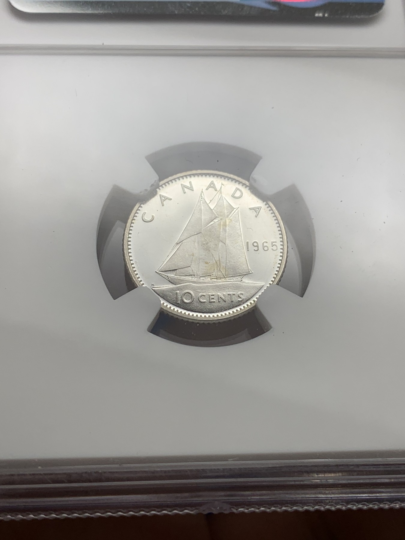 《竞宝斋》第190场-周日，周一 2场 (全场包邮) NGC PL66UC 加拿大1965年精制10分帆船银币 镜面感超强