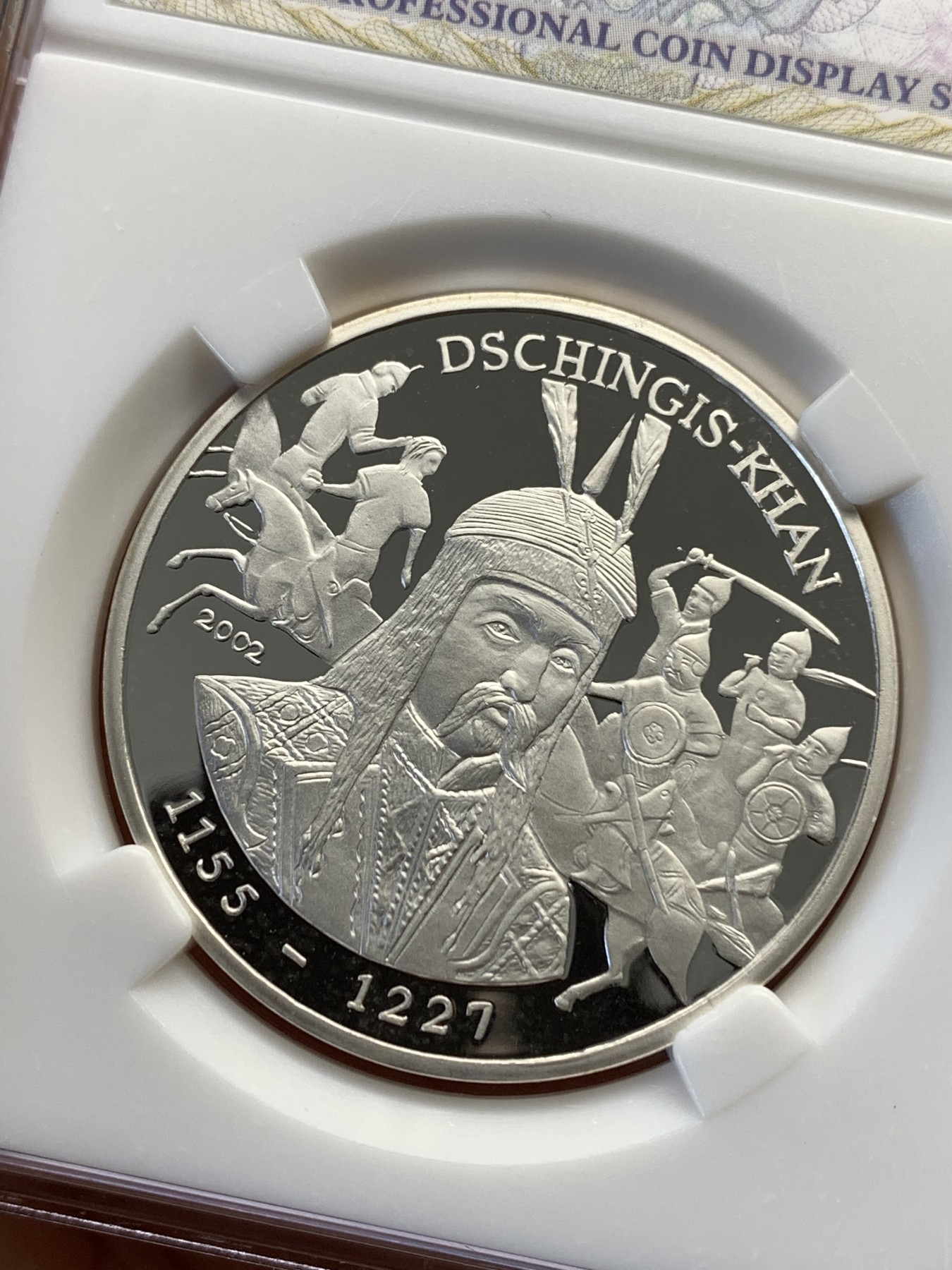 《竞宝斋》第190场-周日，周一 2场 (全场包邮) 乍得成吉思汗1000法郎纪念银币，重现古战场画面，背面美女等待英雄凯旋