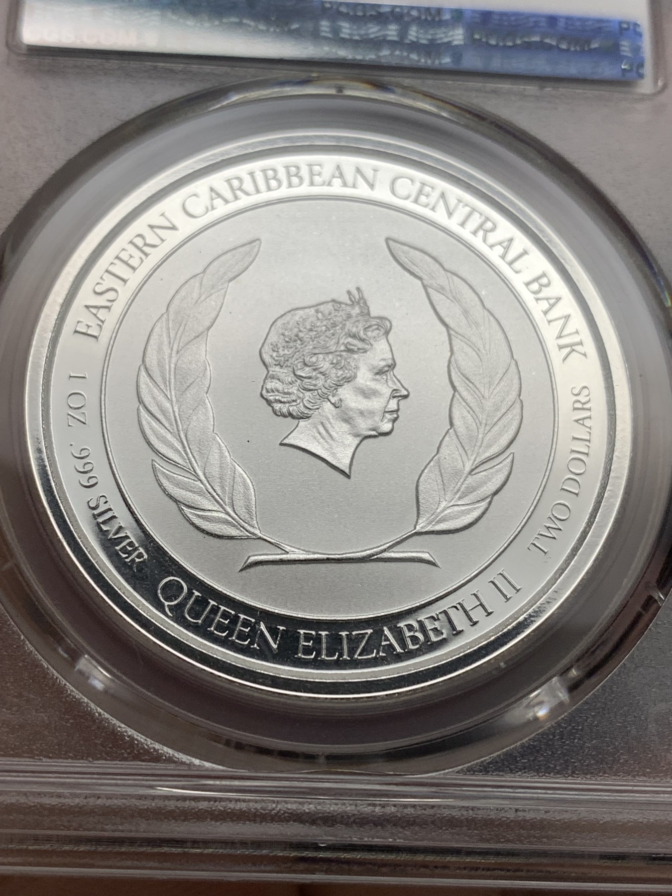 《竞宝斋》第190场-周日，周一 2场 (全场包邮) PCGS金盾 MS69 东加勒比2021年2元精制银币，唯一冠军分