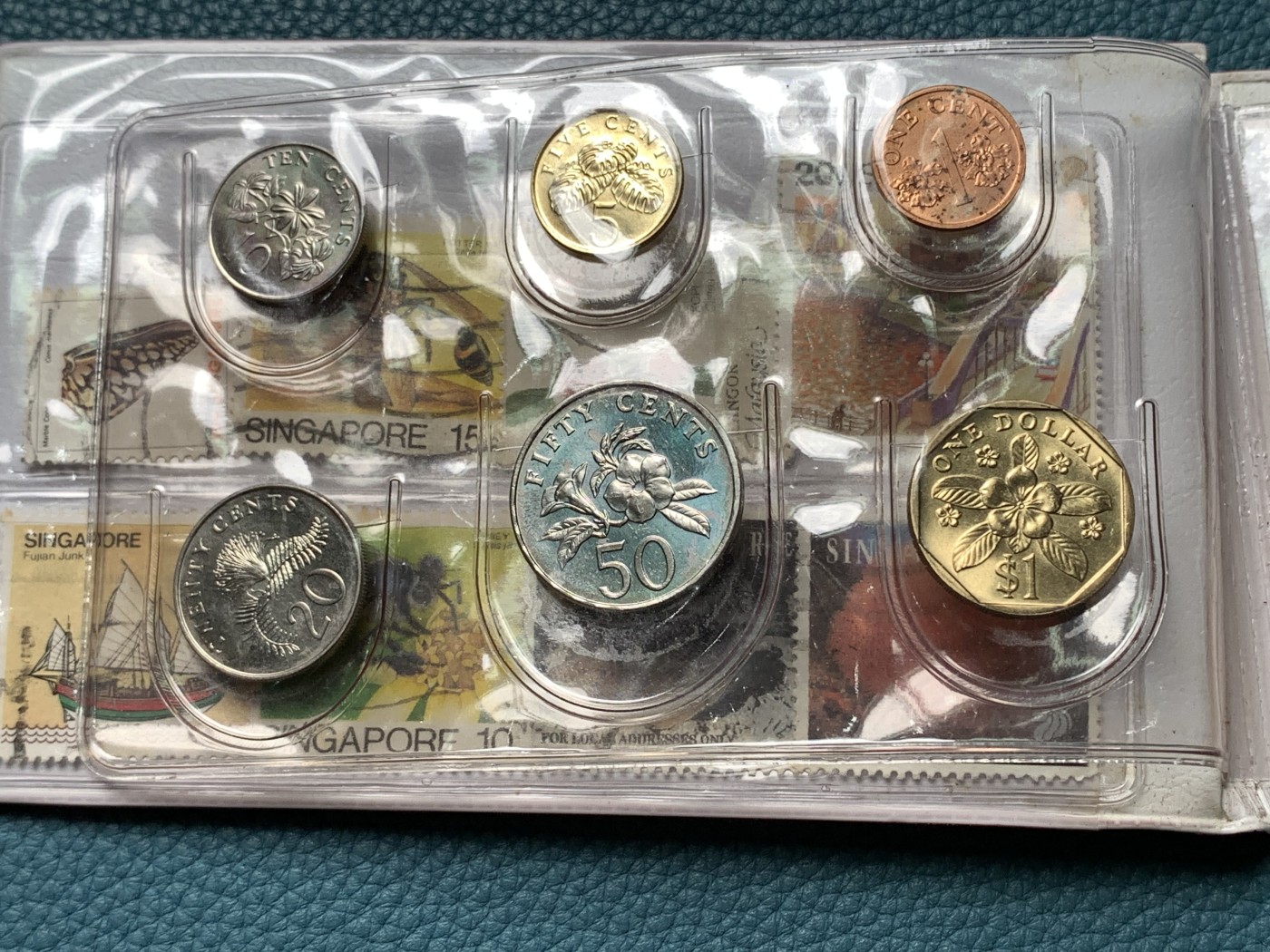 《竞宝斋》第190场-周日，周一 2场 (全场包邮) 新加坡1989年流通硬币6枚套蛇年生肖纪念卡册、新加坡马来西亚邮币册、马来亚和英属婆罗洲UNC品硬币4枚