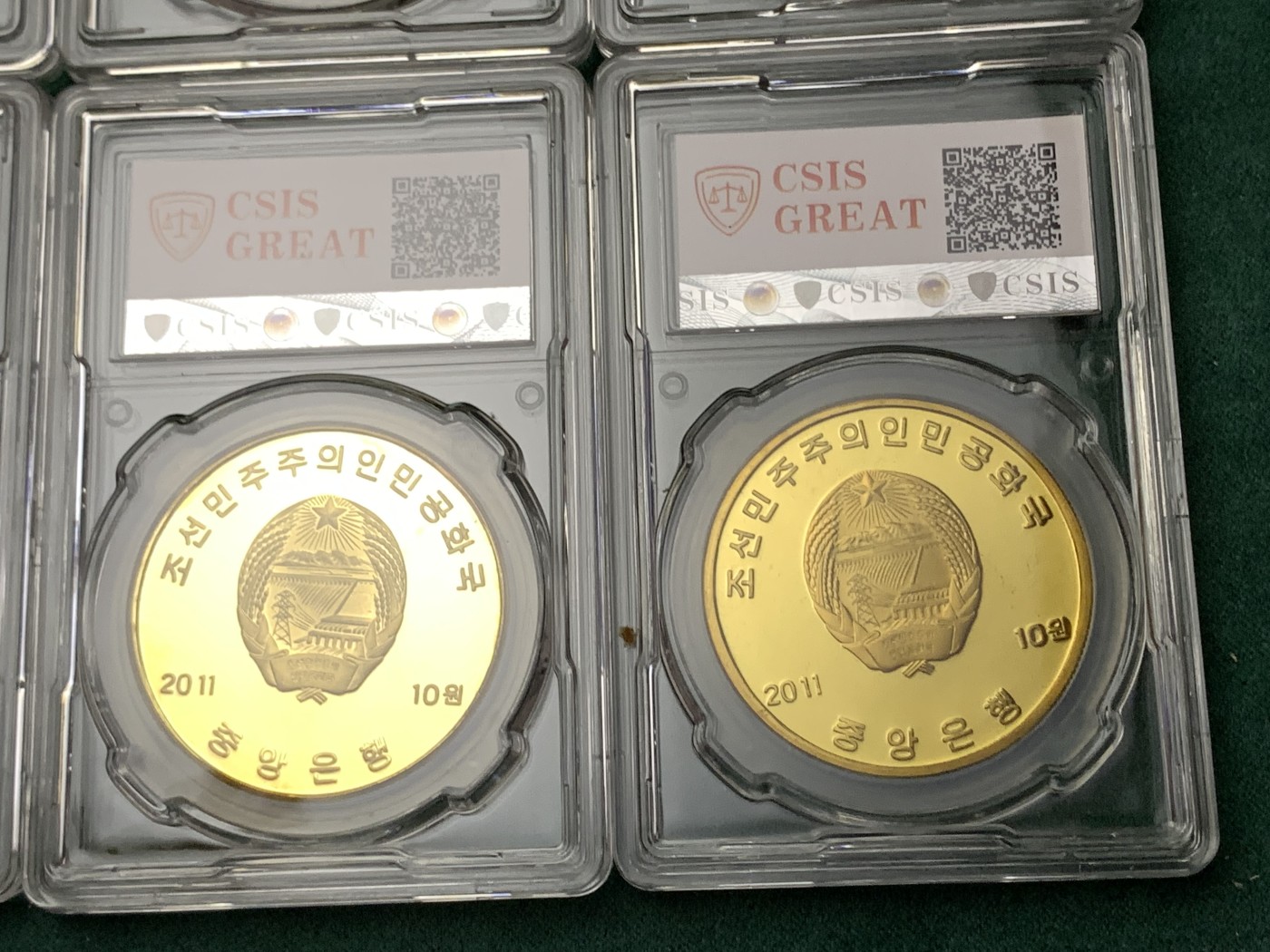 《竞宝斋》第190场-周日，周一 2场 (全场包邮) 朝鲜2011年金刚上名胜古迹精致纪念铜币10枚，图案设计精美，背面为朝鲜国徽，收藏之佳品，难得