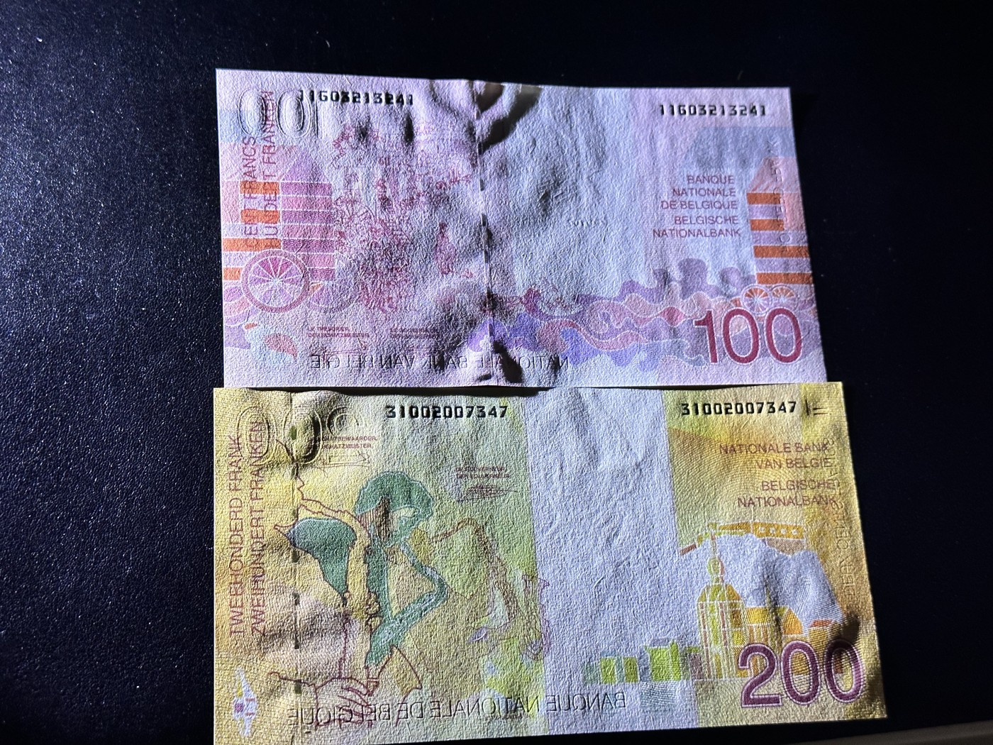 《外钞收藏家》第二百九十一期（荷兰比利时卢森堡欧元专场）（连拍第二场） 比利时100法郎，200法郎，萨克斯 全新UNC