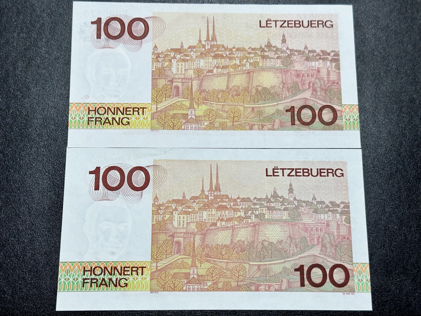 《外钞收藏家》第二百九十一期（荷兰比利时卢森堡欧元专场）（连拍第二场） 卢森堡80年代100法郎2枚不同，F999970接近关门号 全新UNC