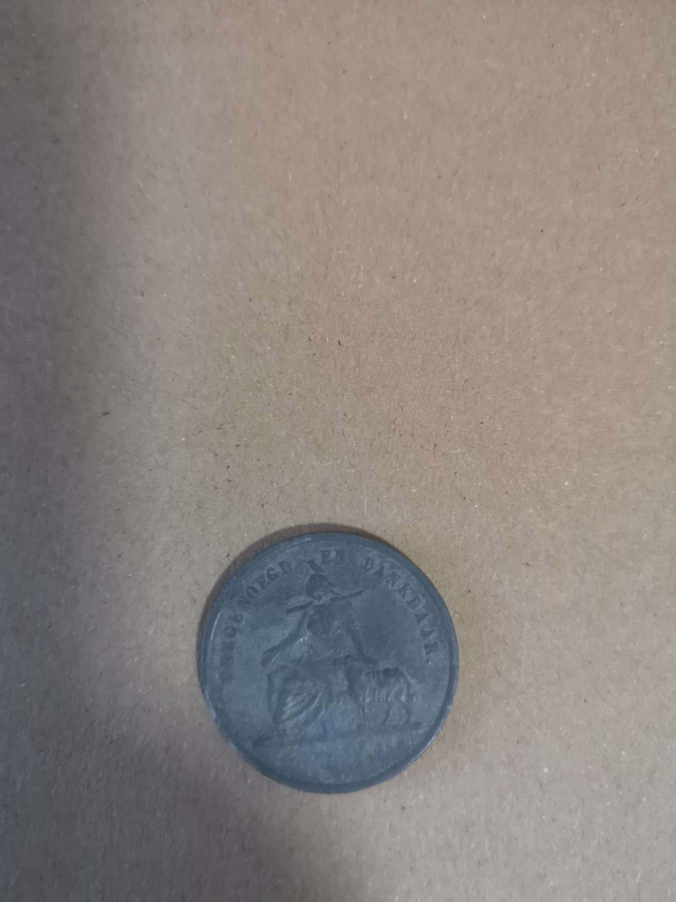 长老汇第32场钱币和邮票拍卖 1861荷兰阿姆斯特丹面包卷代币，这是送给穷人，可以换取面包，很有特色的一枚。eBay80多元一枚，不含运费