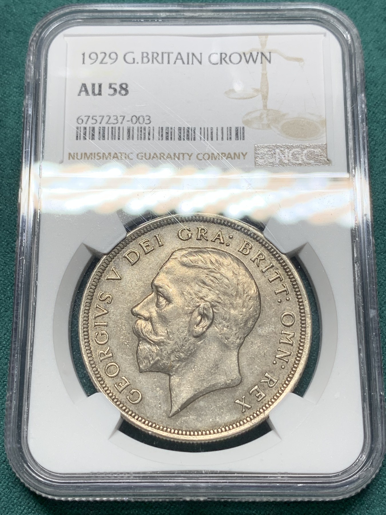 欢迎参加《竞宝斋》为爱冲冲冲 七夕特拍专场 ！第191场 (全场包邮) NGC-AU58 英国1929年乔治五世花冠1克朗银币 不同马剑系列 铸造数量稀少 仅4994枚 价格低地 老味道包浆