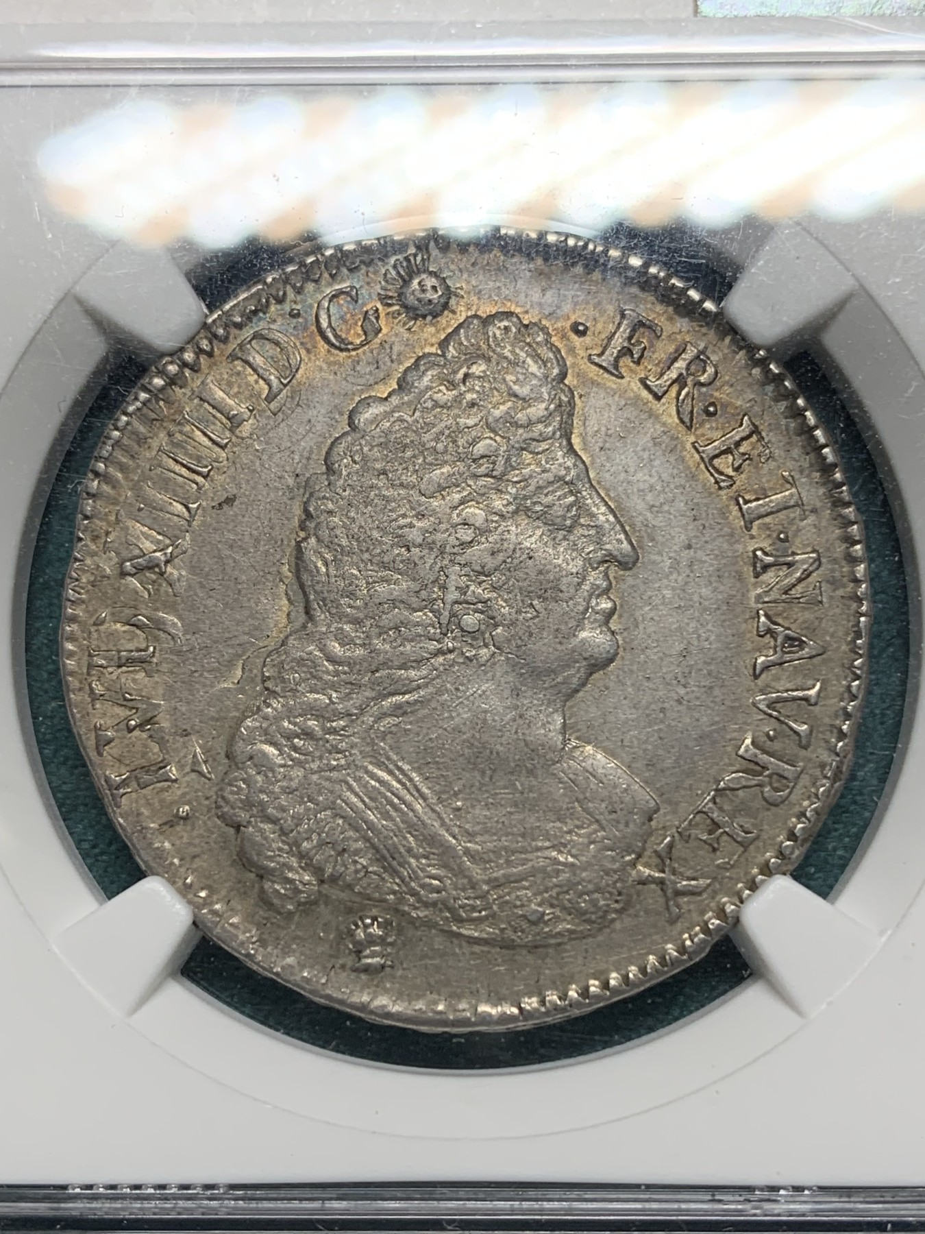 欢迎参加《竞宝斋》为爱冲冲冲 七夕特拍专场 ！第191场 (全场包邮) NGC-AU58 季军分，法国1694年路易十四半埃居，原味淡彩包浆，太阳王埃居出分极难，图卢兹（M）铸币厂，少见高分好品，18年HA的AU55分拍了408美元