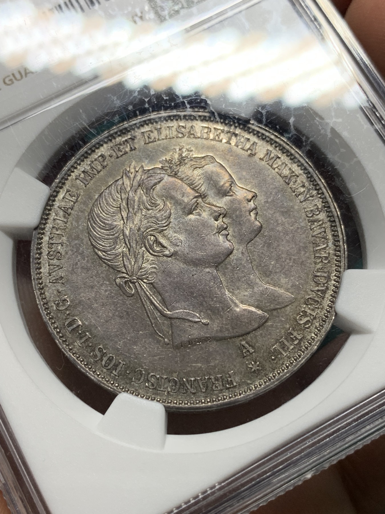 欢迎参加《竞宝斋》为爱冲冲冲 七夕特拍专场 ！第191场 (全场包邮) NGC-MS62 奥匈帝国 1854年 2盾 茜茜公主 结婚纪念大银币 少见的婚礼版本 比银婚更加稀有 原味包浆 背部浮雕神圣深邃 大热品种