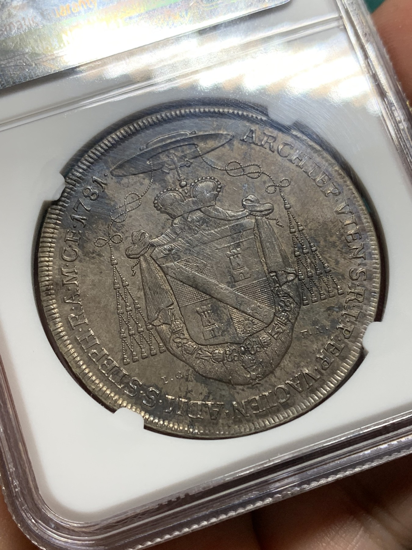 欢迎参加《竞宝斋》为爱冲冲冲 七夕特拍专场 ！第191场 (全场包邮) NGC-AU58 神圣罗马帝国 1781年 奥地利维也纳教区 克里斯多夫.安东 红衣大主教 1泰勒 酱彩泛金咖色包浆 极少见的维也纳品种 克书指导价UNC 1700刀 去年国内成交一枚MS62 12000RMB