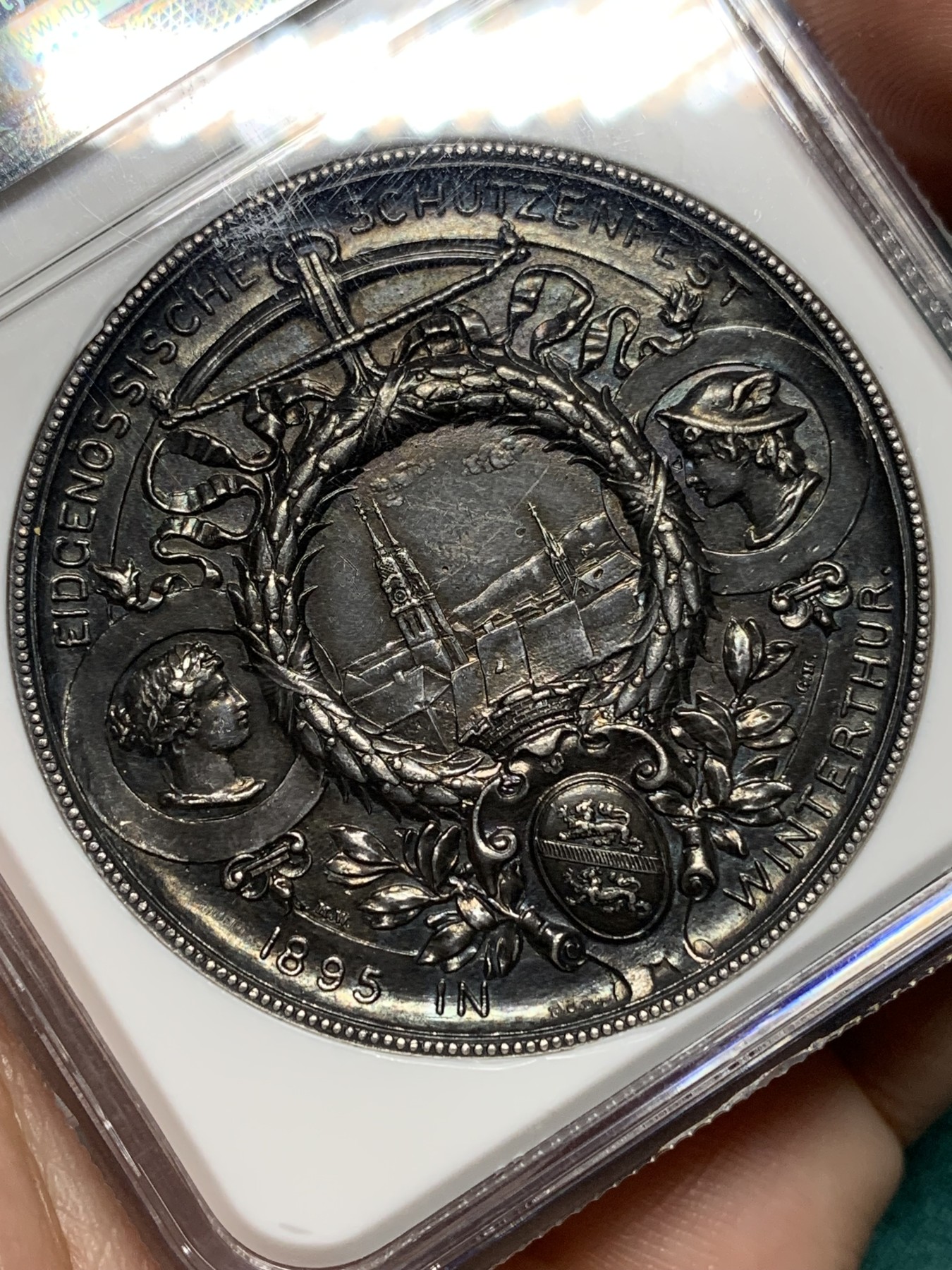欢迎参加《竞宝斋》为爱冲冲冲 七夕特拍专场 ！第191场 (全场包邮) NGC AU58 1895年瑞士苏黎世射击节大银章，真正的黑美人，犹如美画，美轮美奂，尽显历史沧桑感