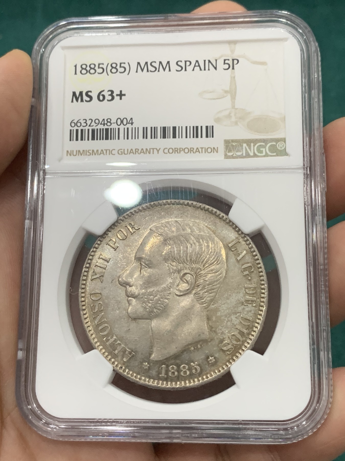 欢迎参加《竞宝斋》为爱冲冲冲 七夕特拍专场 ！第191场 (全场包邮) NGC-MS63+ 西班牙1885（85）阿方索十二世 5比塞塔大银  底光强烈 双面淡金彩包浆 季军分 更高分仅2枚 一步到位的藏品