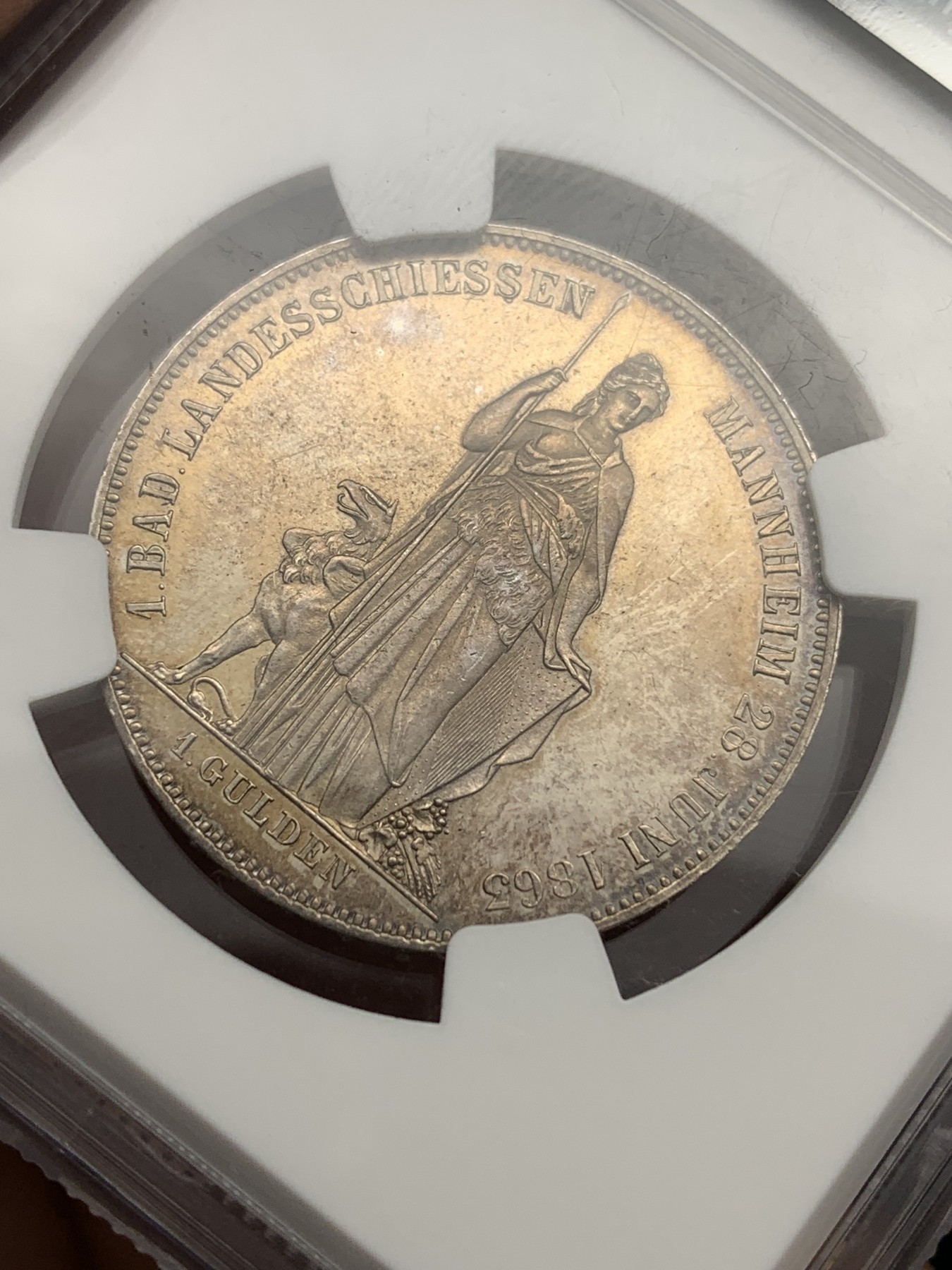 欢迎参加《竞宝斋》为爱冲冲冲 七夕特拍专场 ！第191场 (全场包邮) NGC MS62 德国巴登1863年狩猎节1盾银币，淡金泛蓝包浆，很漂亮 极少品种