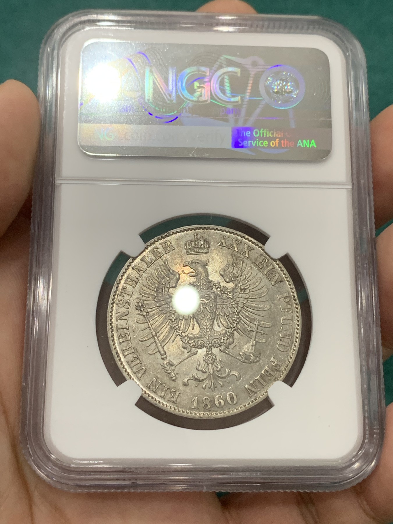 欢迎参加《竞宝斋》为爱冲冲冲 七夕特拍专场 ！第191场 (全场包邮) NGC-MS62 德国普鲁士洋葱头1860A 1泰勒银币 少见未流通好品 原状态连续转光 离冠鹰少见版本