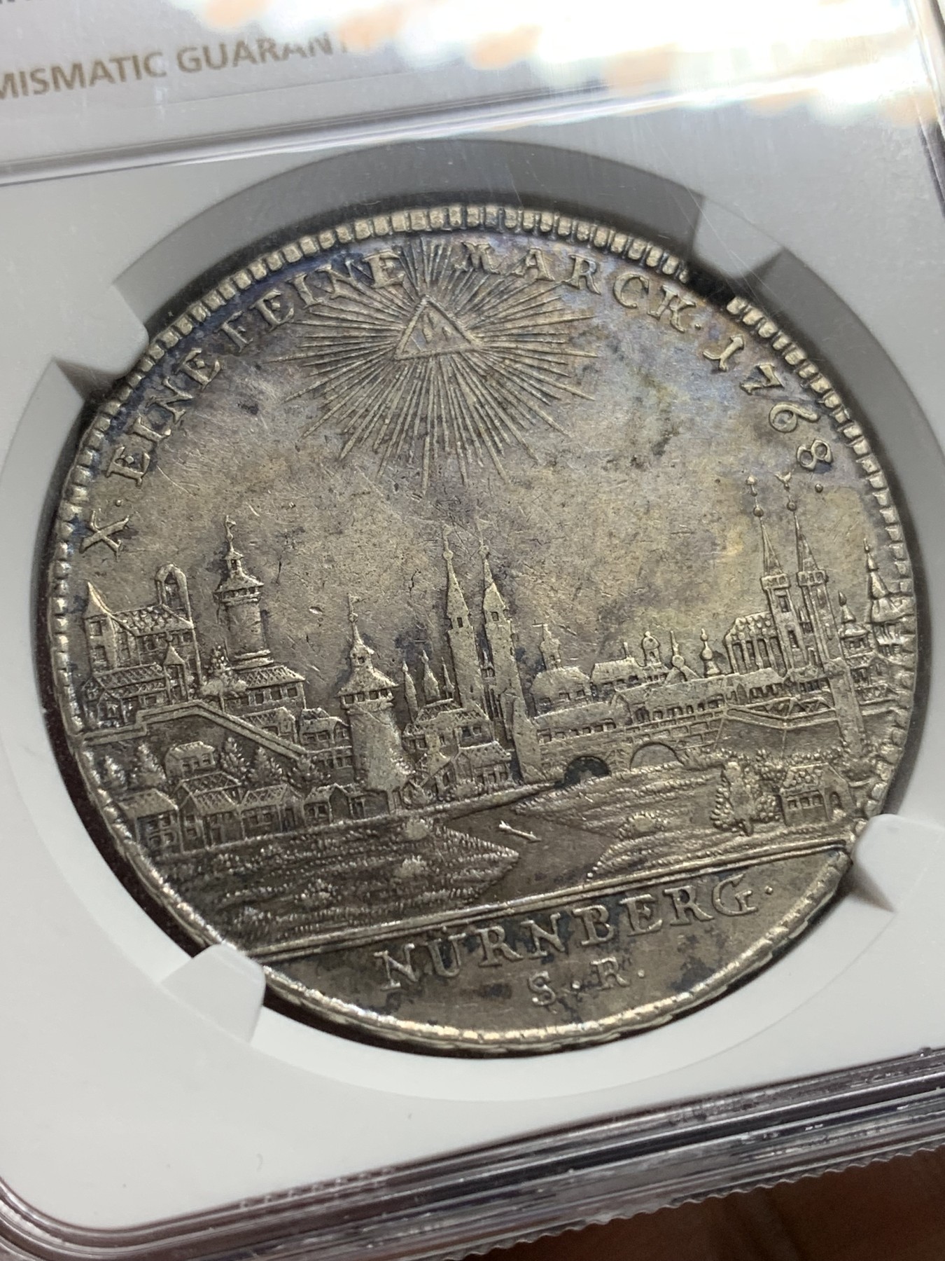欢迎参加《竞宝斋》为爱冲冲冲 七夕特拍专场 ！第191场 (全场包邮) NGC-AU50德国 德意志地区 纽伦堡景观泰勒大银币 1768年的难得有分 包浆醇厚自然微微带彩
