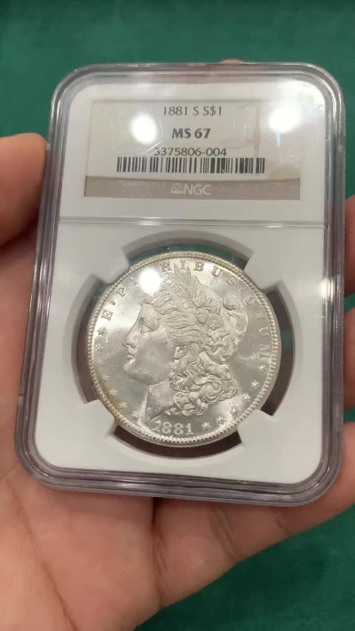 欢迎参加《竞宝斋》为爱冲冲冲 七夕特拍专场 ！第191场 (全场包邮) NGC-MS67 美国1881S  1美元 摩根银币 这个分数是摩根分水岭 市面上不多见了，买一枚少一枚 强车轮光 镜面底板