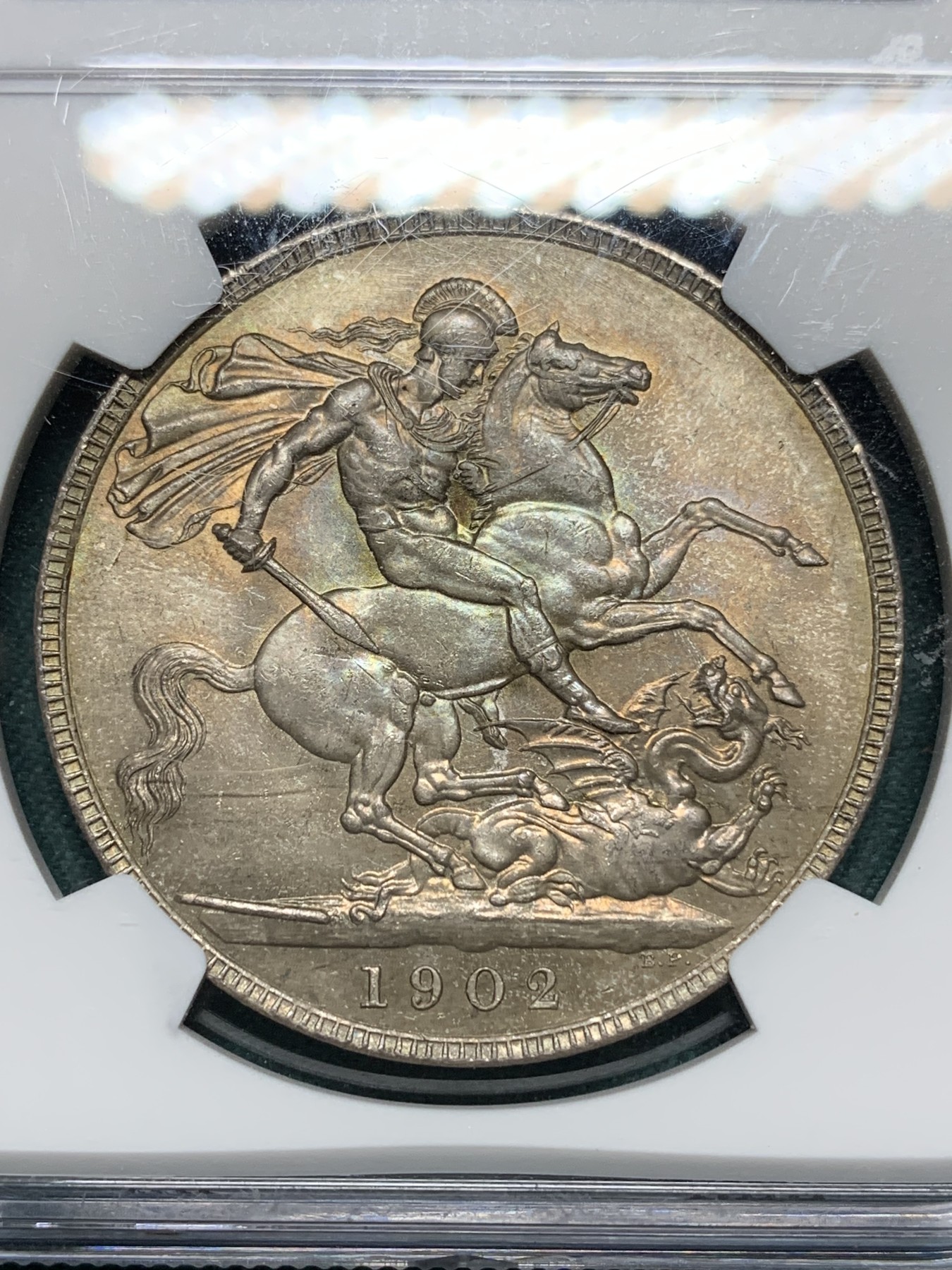 欢迎参加《竞宝斋》为爱冲冲冲 七夕特拍专场 ！第191场 (全场包邮) NGC MS64 英国1902 爱德华七世马剑1克朗精制银币 深彩包浆 MS的上64就比PF的难得大不少