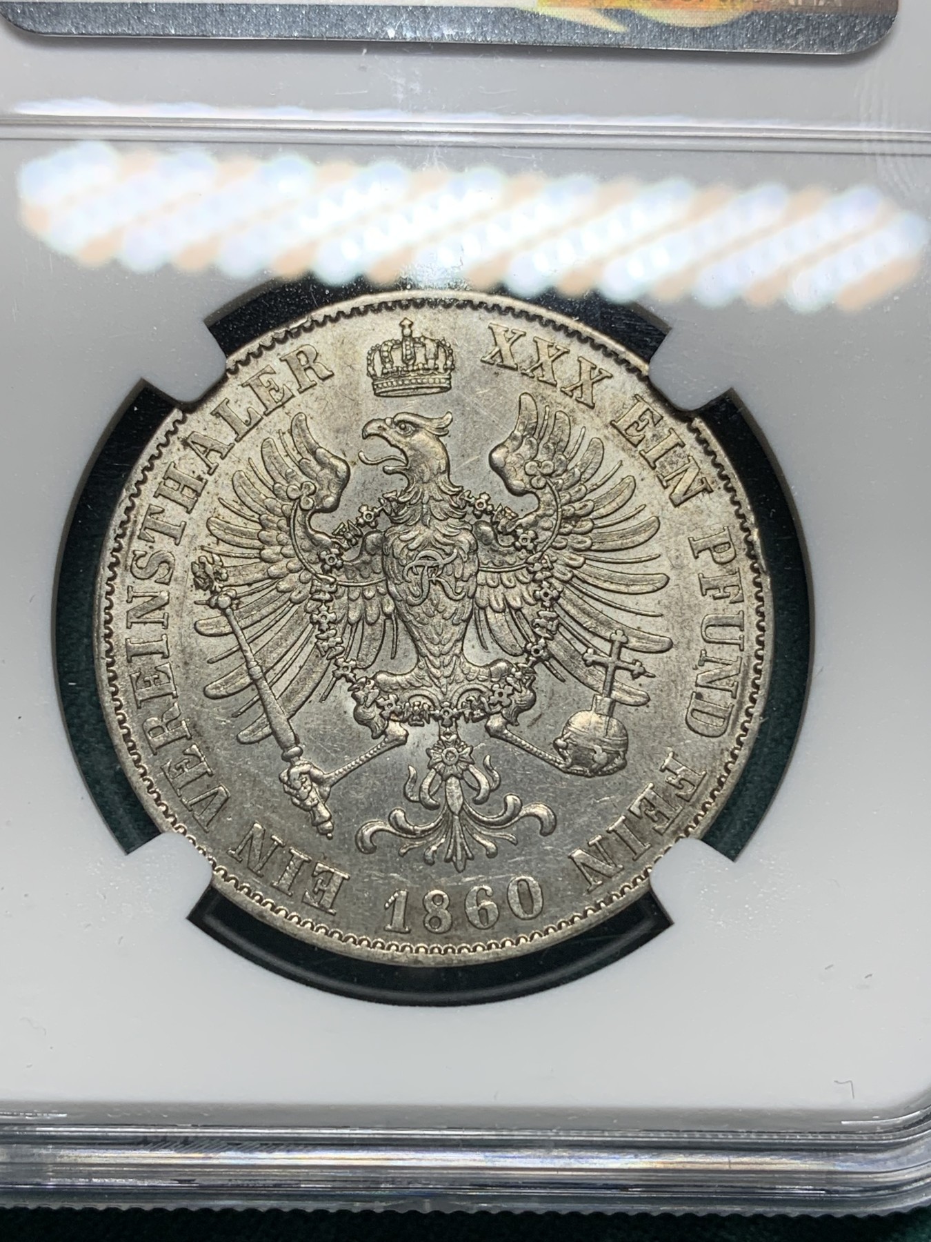 欢迎参加《竞宝斋》为爱冲冲冲 七夕特拍专场 ！第191场 (全场包邮) NGC-MS62 德国普鲁士洋葱头1860A 1泰勒银币 少见未流通好品 原状态连续转光 离冠鹰少见版本