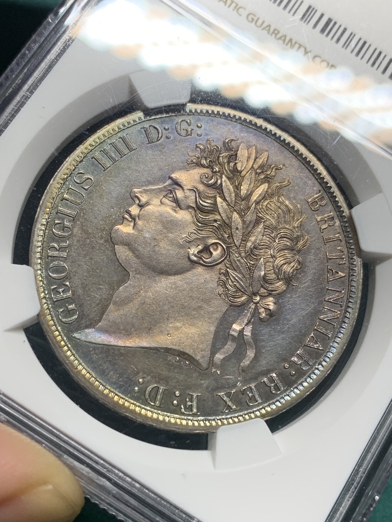 欢迎参加《竞宝斋》为爱冲冲冲 七夕特拍专场 ！第191场 (全场包邮) NGC MS62 英国 1821乔治四世马剑克朗银币，淡蓝色无敌包浆 极品状态