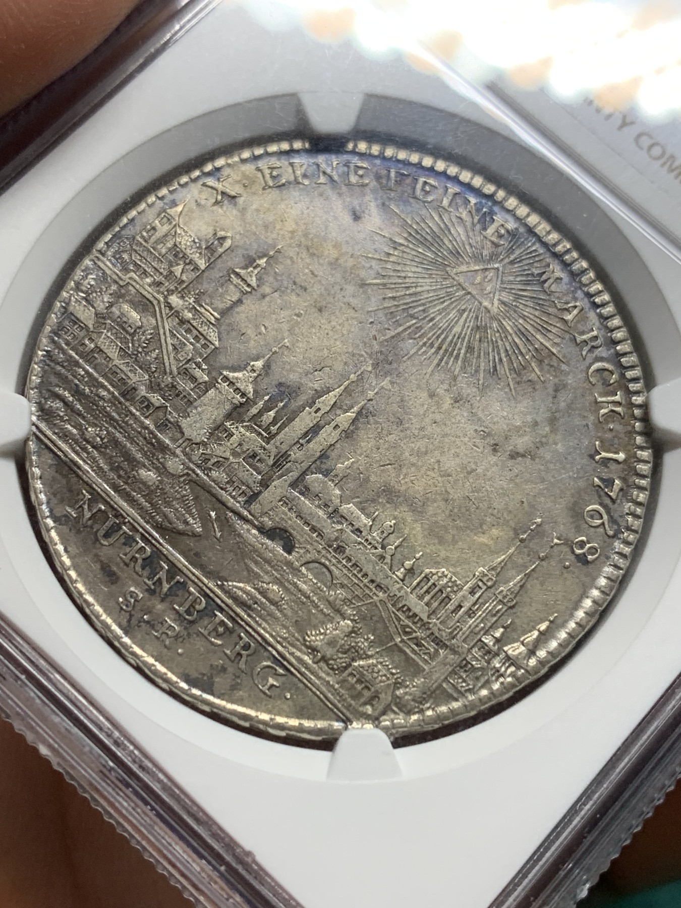 欢迎参加《竞宝斋》为爱冲冲冲 七夕特拍专场 ！第191场 (全场包邮) NGC-AU50德国 德意志地区 纽伦堡景观泰勒大银币 1768年的难得有分 包浆醇厚自然微微带彩