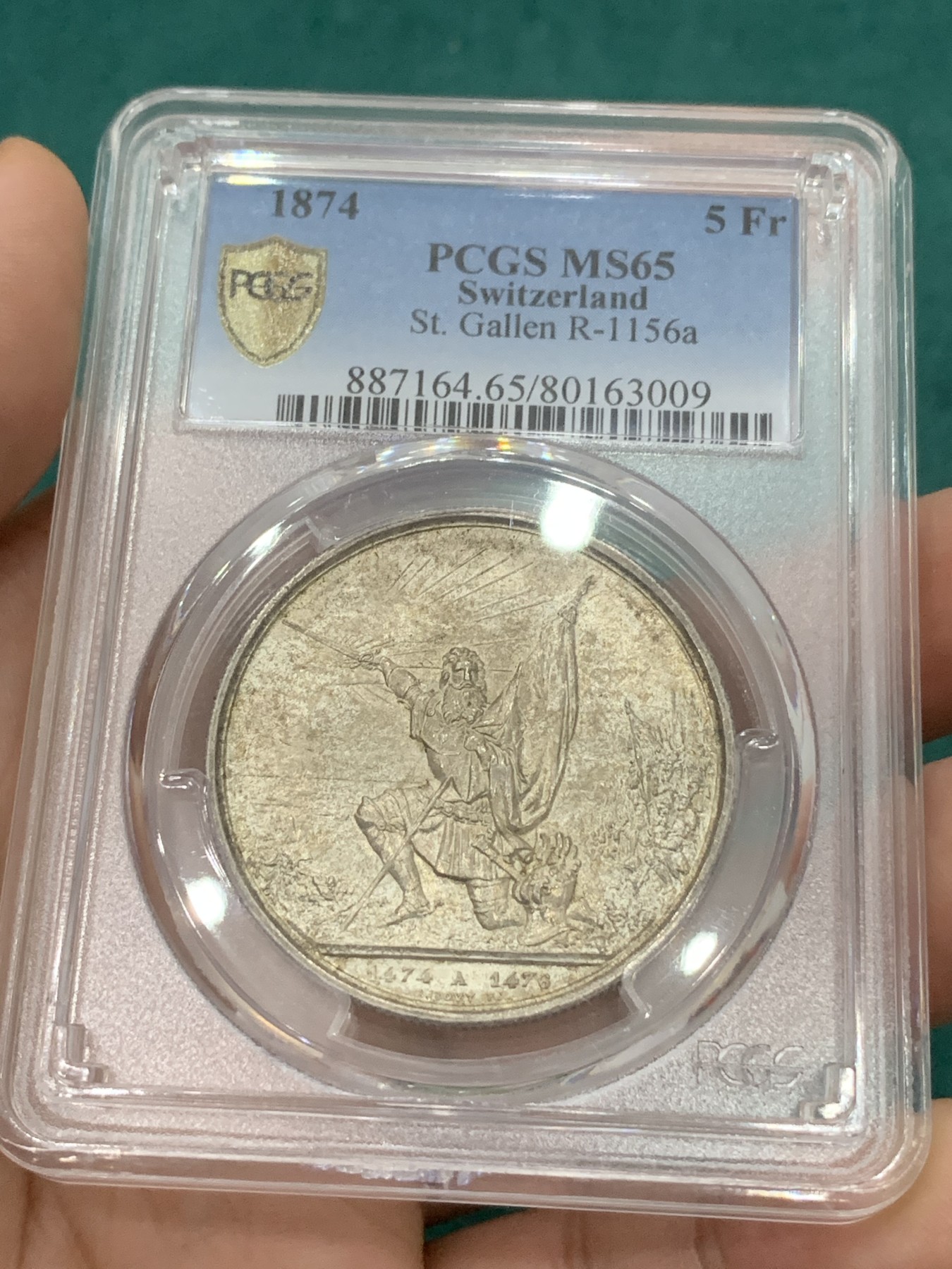 欢迎参加《竞宝斋》为爱冲冲冲 七夕特拍专场 ！第191场 (全场包邮) PCGS MS65 1874年瑞士圣加仑射击节5法郎银币，欧洲纸袋包浆，高分品质凤毛麟角，早期严评，人物高点表情俱在