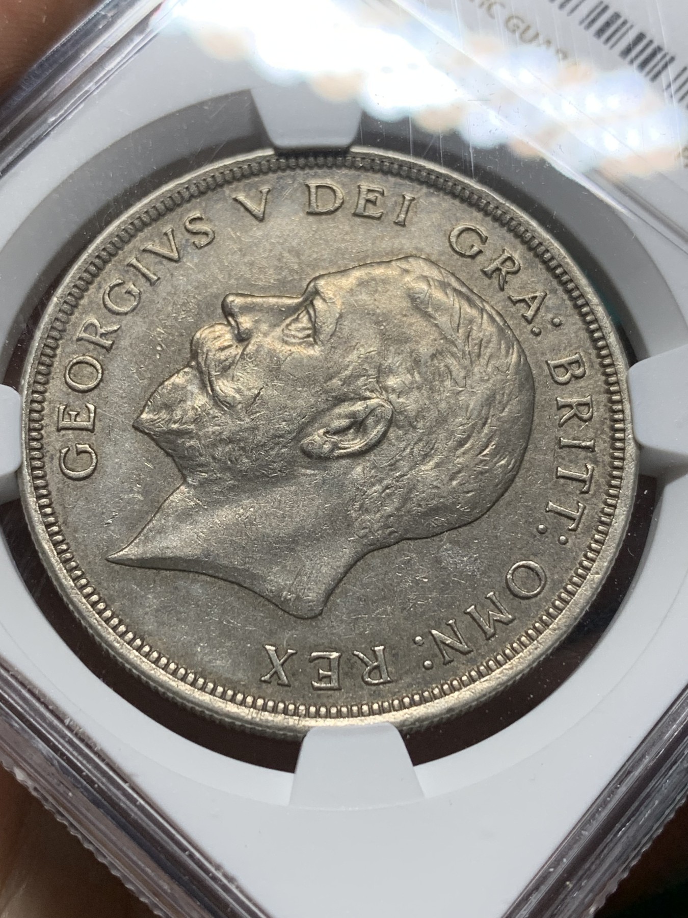 欢迎参加《竞宝斋》为爱冲冲冲 七夕特拍专场 ！第191场 (全场包邮) NGC-AU58 英国1929年乔治五世花冠1克朗银币 不同马剑系列 铸造数量稀少 仅4994枚 价格低地 老味道包浆