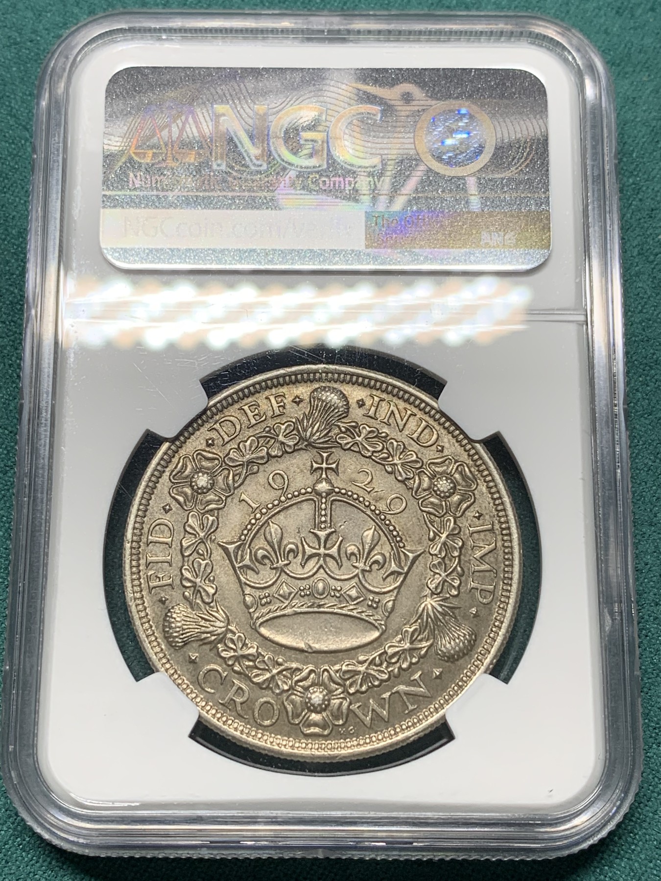 欢迎参加《竞宝斋》为爱冲冲冲 七夕特拍专场 ！第191场 (全场包邮) NGC-AU58 英国1929年乔治五世花冠1克朗银币 不同马剑系列 铸造数量稀少 仅4994枚 价格低地 老味道包浆
