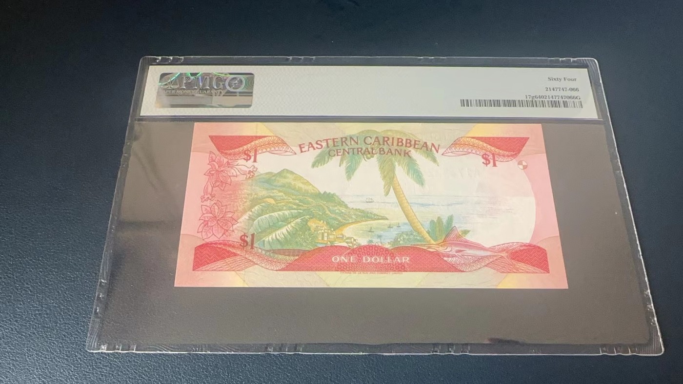 收藏联盟Quantum Auction 第282期拍卖 “多水之乡”-法属圭亚那 东加勒比国家(格林纳达)1985-88年1元 PMG64 首发冠
