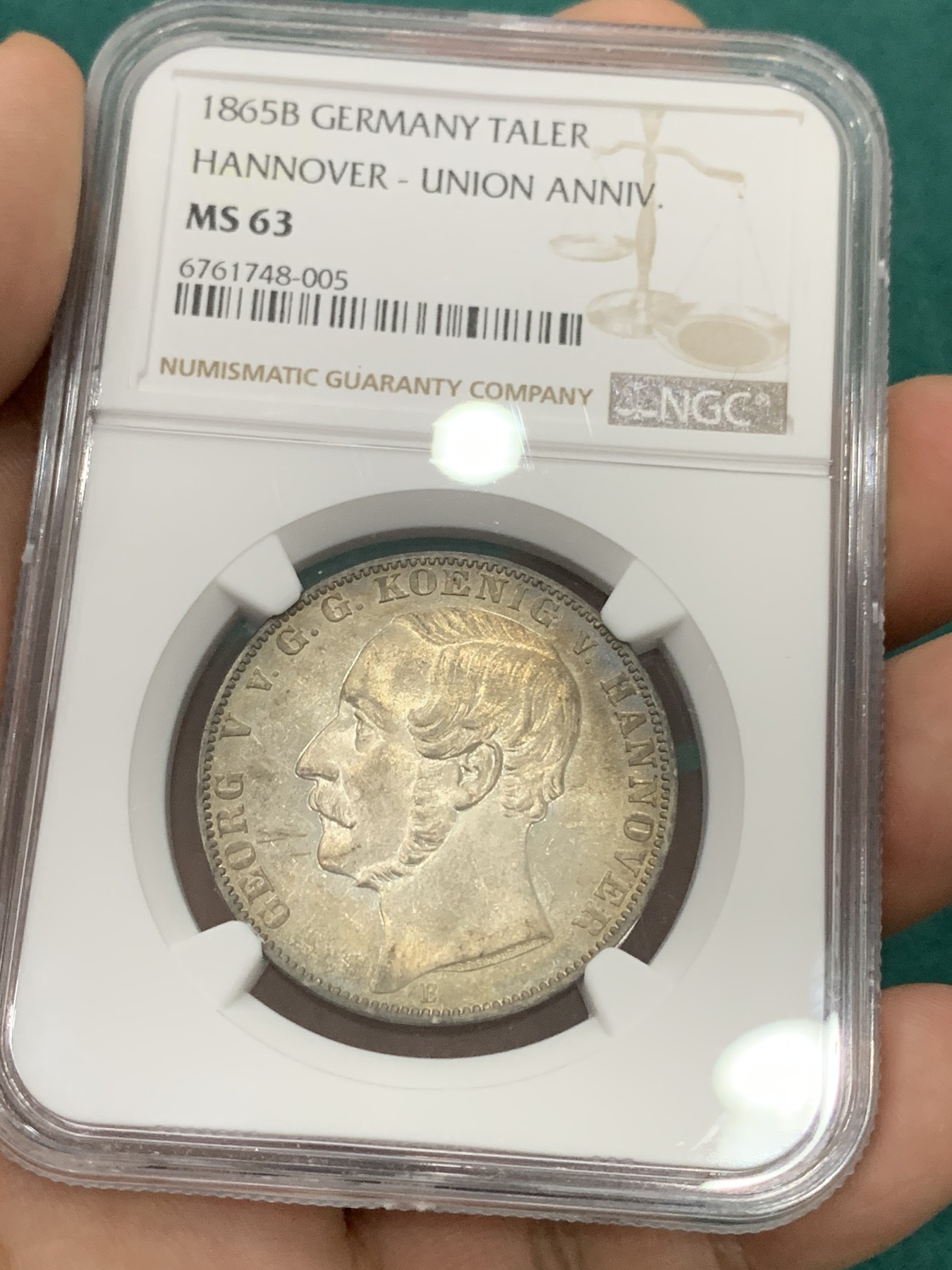 欢迎参加《竞宝斋》为爱冲冲冲 七夕特拍专场 ！第191场 (全场包邮) 季军分NGC-MS63分 德国 1865汉诺威和东弗里士兰联合50周年纪念泰勒，发行量1000枚，是同系列橡树泰勒发现量的一半，P+N评级记录一共就29枚。难得一见的汉诺威系列泰勒，状态不用讲，重在少见，收藏潜力巨大。MS65价格已过万。