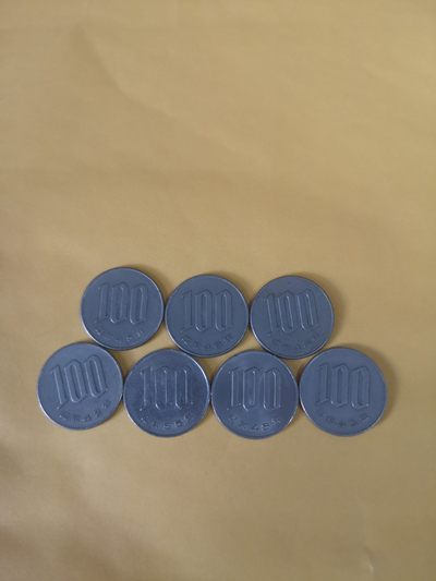 长老汇第34场杂货拍卖 - 日本100日元7枚，汇率35元